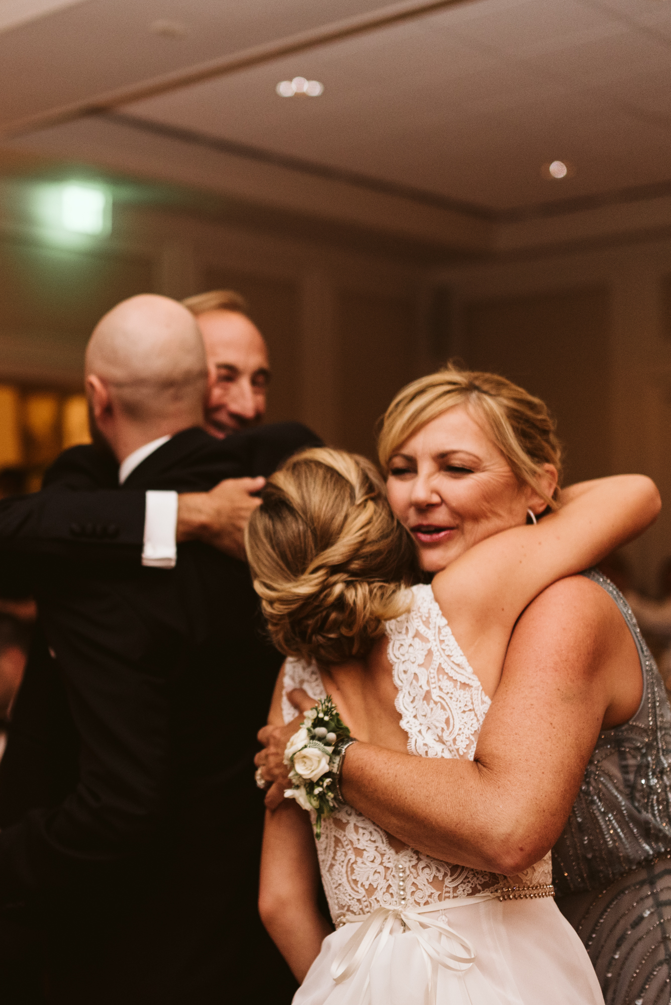 Elegant, Columbia Country Club, Chevy Chase Maryland, Baltimore Wedding Photographer, Classic, Traditional, Bride and Groom Hugging Parents After Toasts, Sweet Hairafter