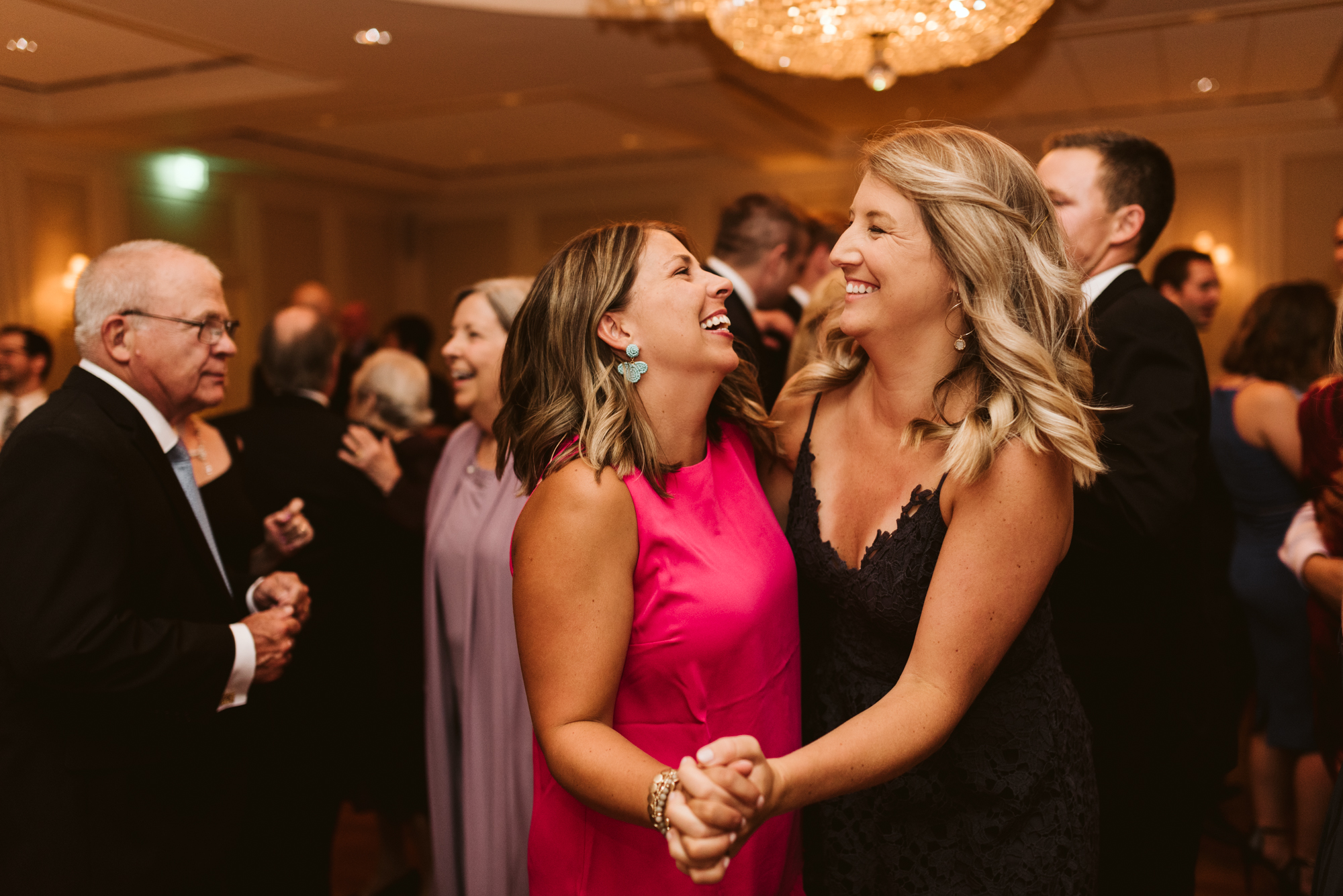 Elegant, Columbia Country Club, Chevy Chase Maryland, Baltimore Wedding Photographer, Classic, Traditional, Two Women Dancing at Wedding Reception, Wedding Guests Laughing on Dance Floor