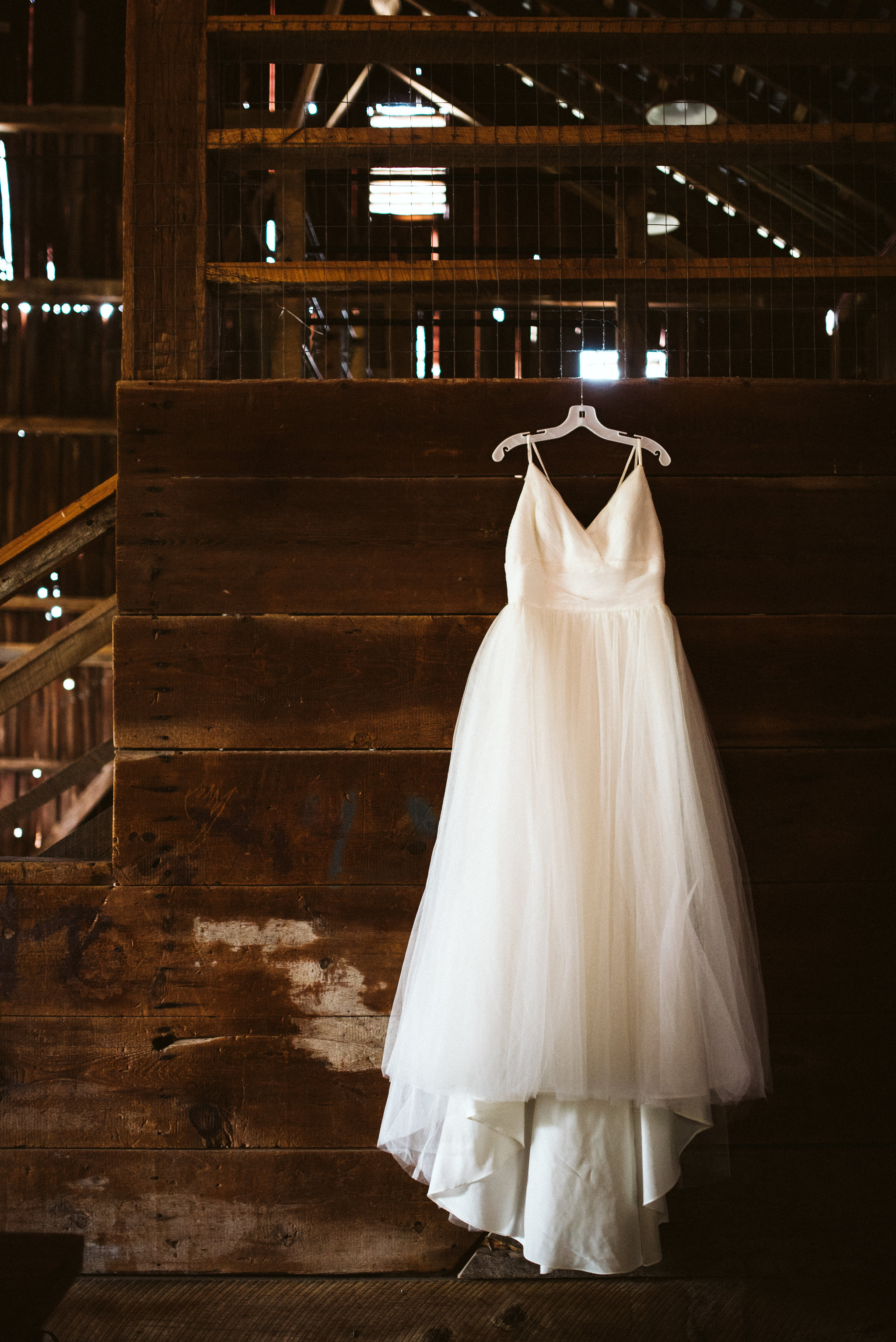 Rocklands Farm, Maryland, Intimate Wedding, Baltimore Wedding Photographer, Sungold Flower Co, Rustic, Romantic, Barn Wedding, Tulle Wedding Dressing Hanging in Barn