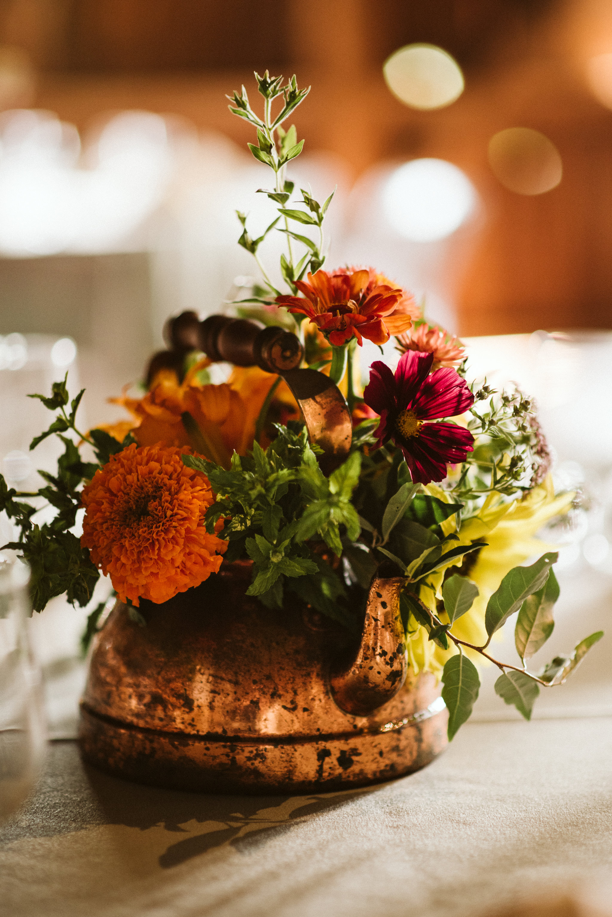 Rocklands Farm, Maryland, Intimate Wedding, Baltimore Wedding Photographer, Sungold Flower Co, Rustic, Romantic, Barn Wedding, Centerpiece, Orange and Maroon flowers in Copper Teapot