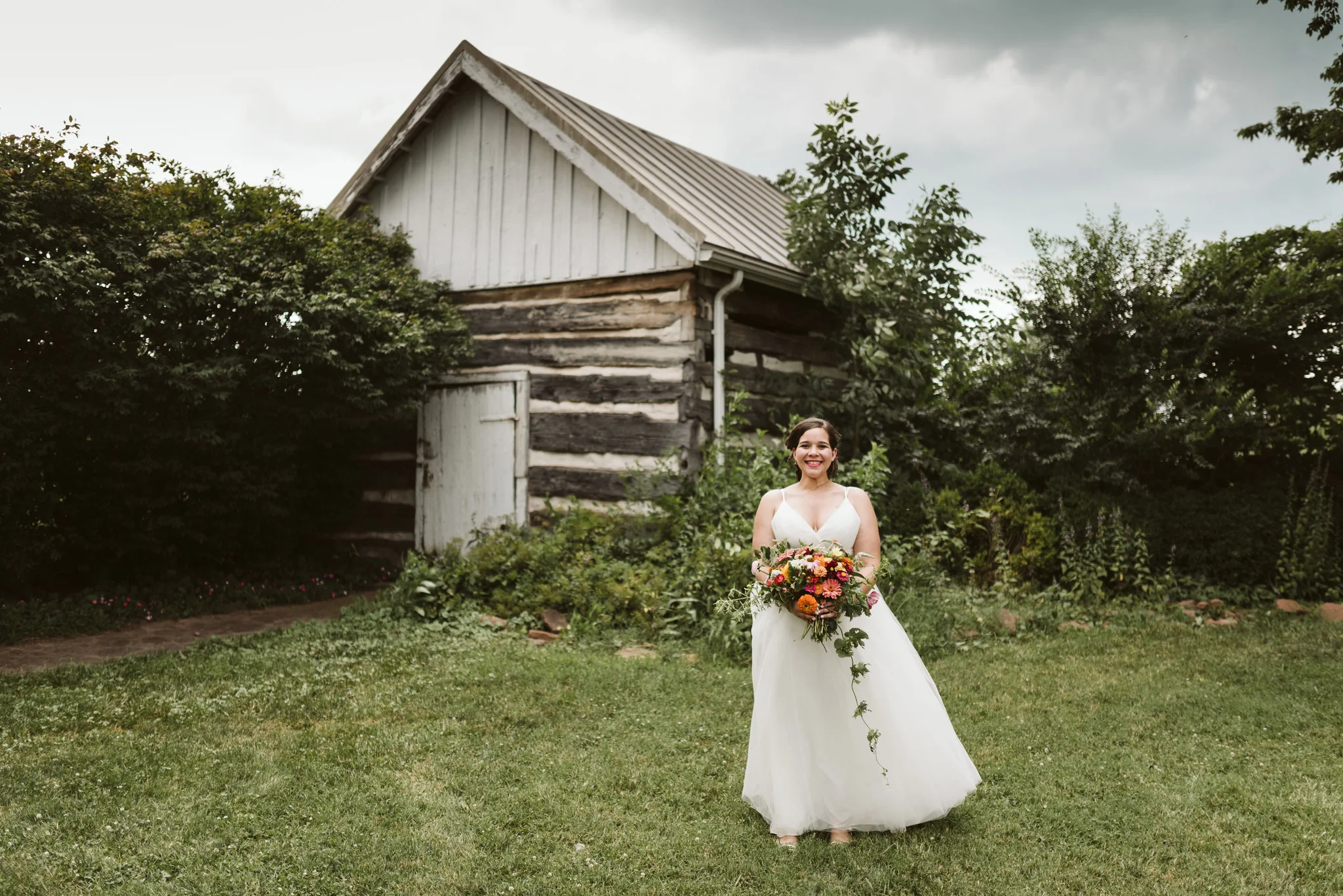 Rocklands Farm, Maryland, Intimate Wedding, Baltimore Wedding Photographer, Sungold Flower Co, Rustic, Romantic, Barn Wedding, Bride Standing Near Barn with Beautiful Bouquet