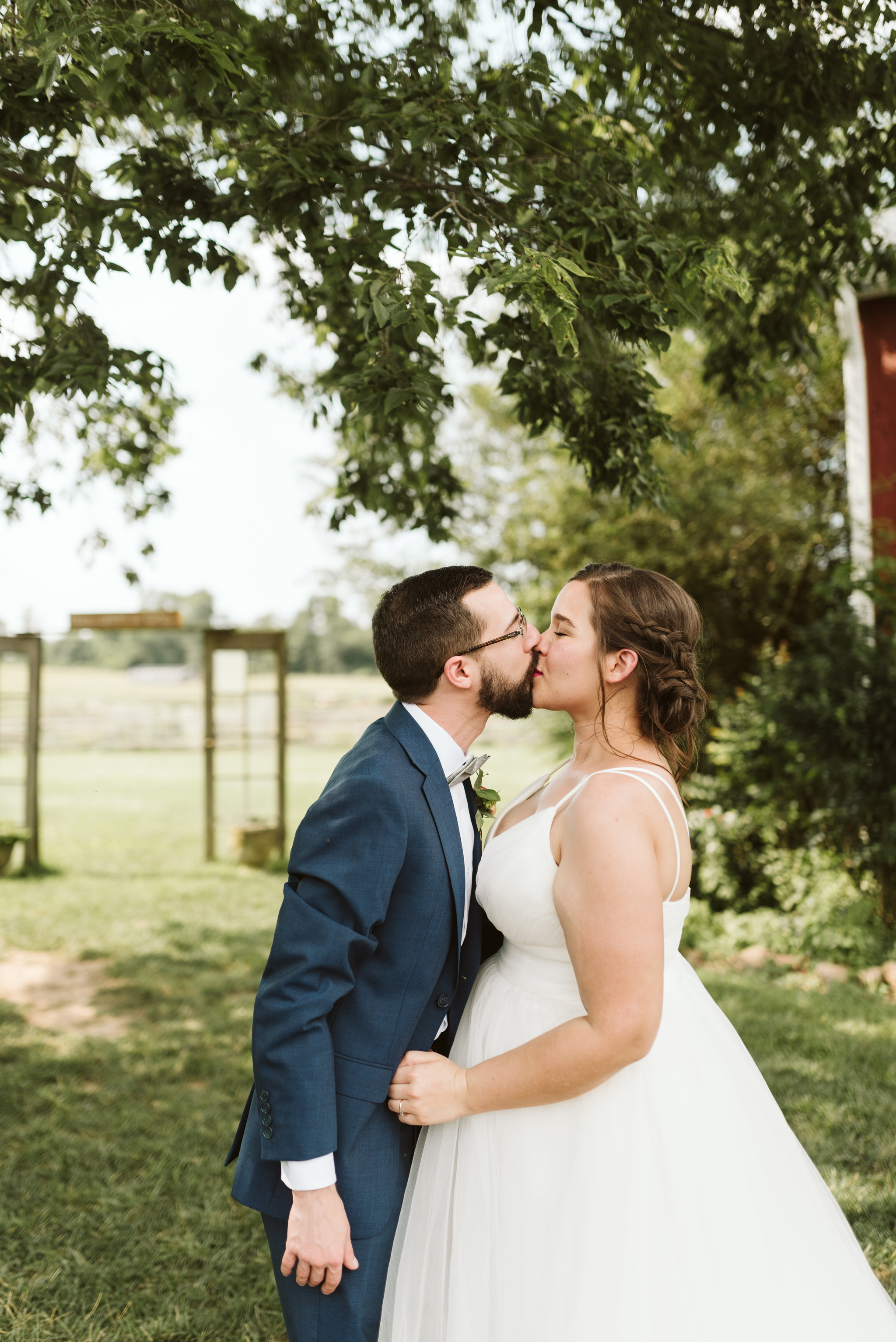 Rocklands Farm, Maryland, Intimate Wedding, Baltimore Wedding Photographer, Sungold Flower Co, Rustic, Romantic, Barn Wedding, Sweet Photo of Bride and Groom Kissing Outside