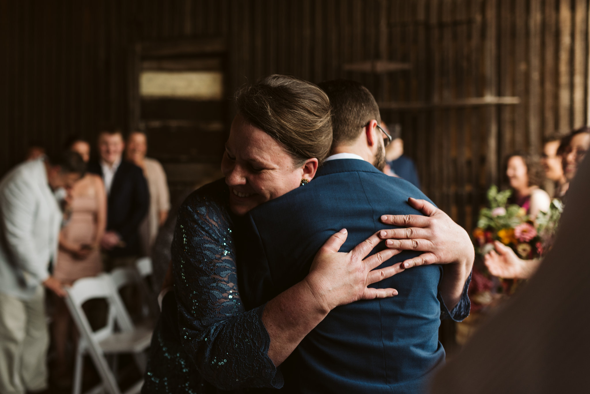 Rocklands Farm, Maryland, Intimate Wedding, Baltimore Wedding Photographer, Sungold Flower Co, Rustic, Romantic, Barn Wedding, Mother of the Bride Hugging Groom at Ceremony