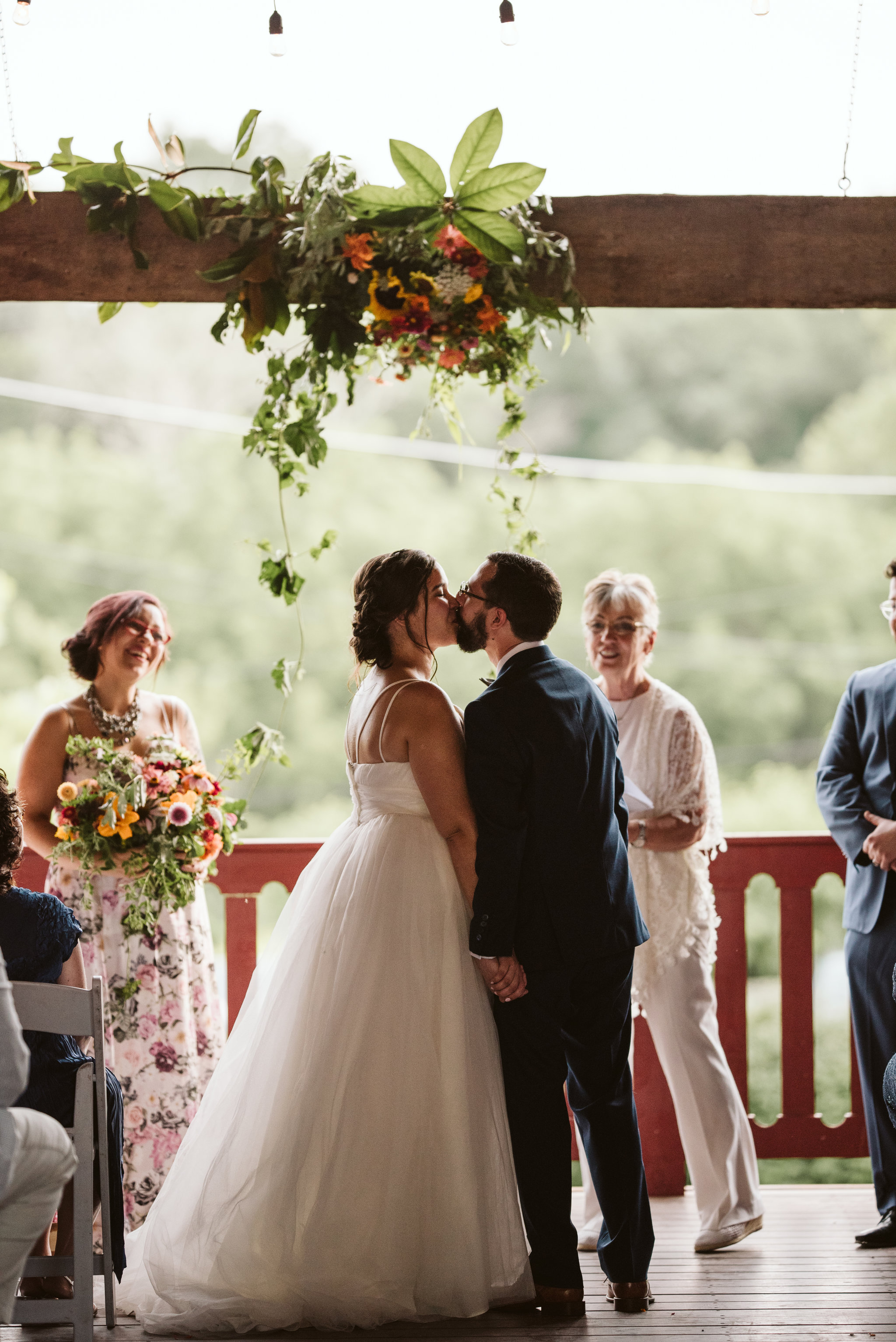 Rocklands Farm, Maryland, Intimate Wedding, Baltimore Wedding Photographer, Sungold Flower Co, Rustic, Romantic, Barn Wedding, Bride and Groom First Kiss Under Flowers