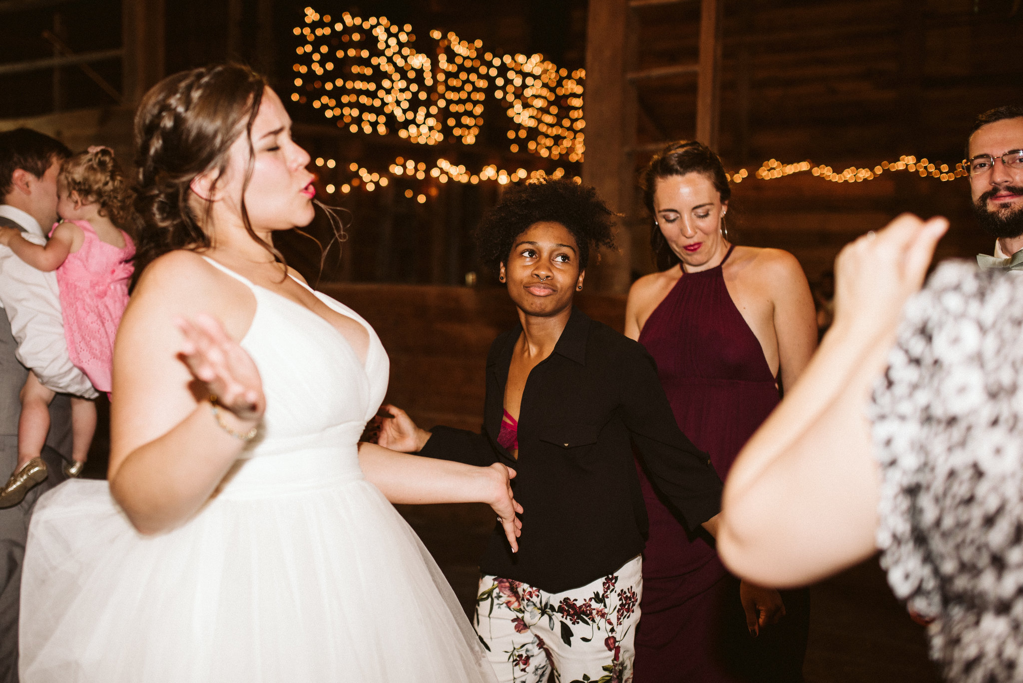 Rocklands Farm, Maryland, Intimate Wedding, Baltimore Wedding Photographer, Sungold Flower Co, Rustic, Romantic, Barn Wedding, Bride Dancing with Friends at Reception