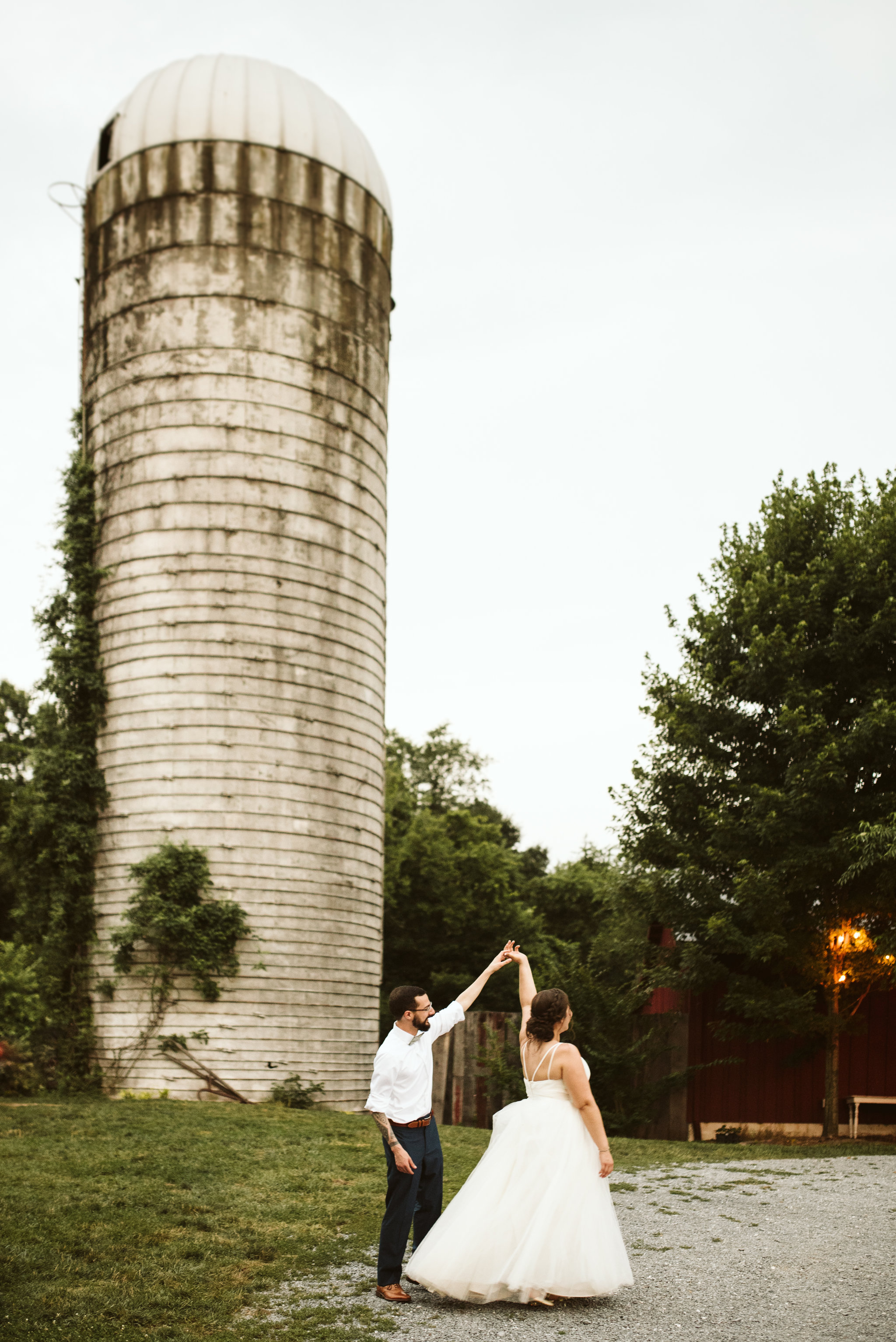 Rocklands Farm, Maryland, Intimate Wedding, Baltimore Wedding Photographer, Sungold Flower Co, Rustic, Romantic, Barn Wedding, Bride and Groom Dancing Outside by Silo