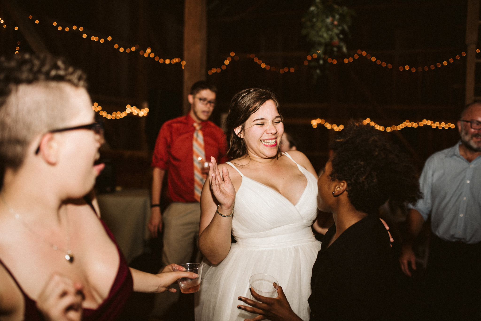 Rocklands Farm, Maryland, Intimate Wedding, Baltimore Wedding Photographer, Sungold Flower Co, Rustic, Romantic, Barn Wedding, Bride Laughing and Dancing with Friends