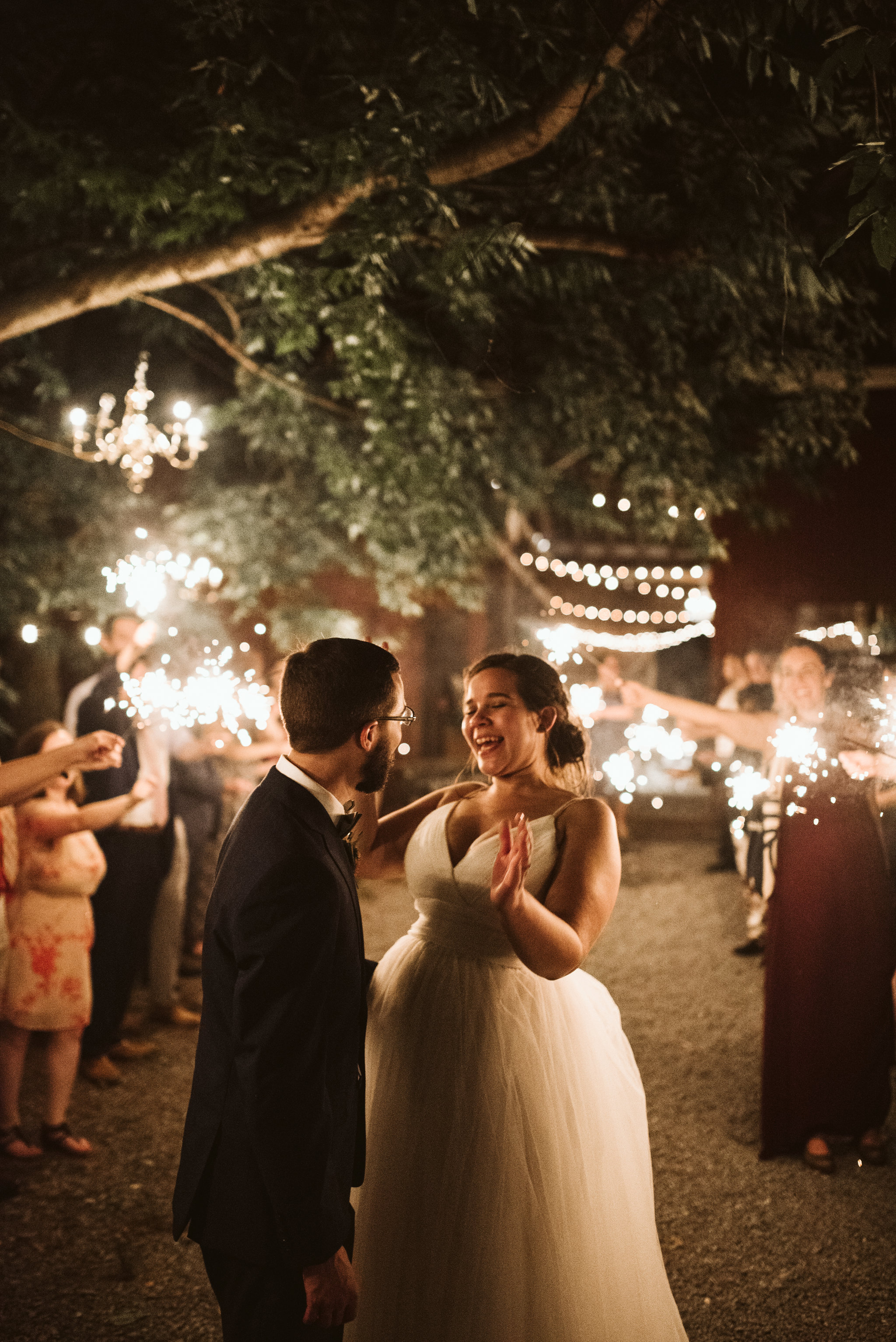 Rocklands Farm, Maryland, Intimate Wedding, Baltimore Wedding Photographer, Sungold Flower Co, Rustic, Romantic, Barn Wedding, Bride and Groom Laughing While Surrounded by Sparklers