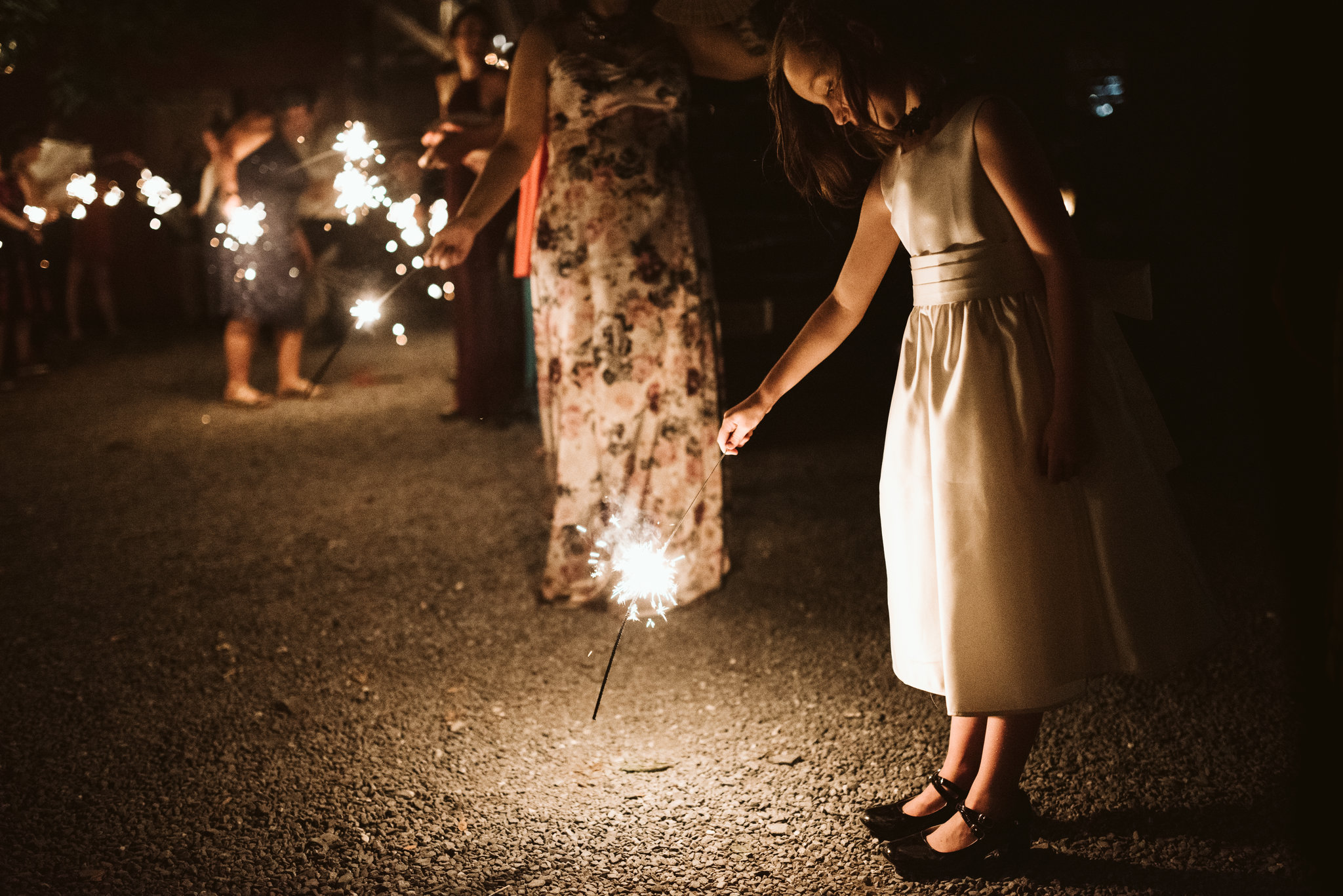 Rocklands Farm, Maryland, Intimate Wedding, Baltimore Wedding Photographer, Sungold Flower Co, Rustic, Romantic, Barn Wedding, Flower Girl Outside with Sparkler, Nighttime Photo