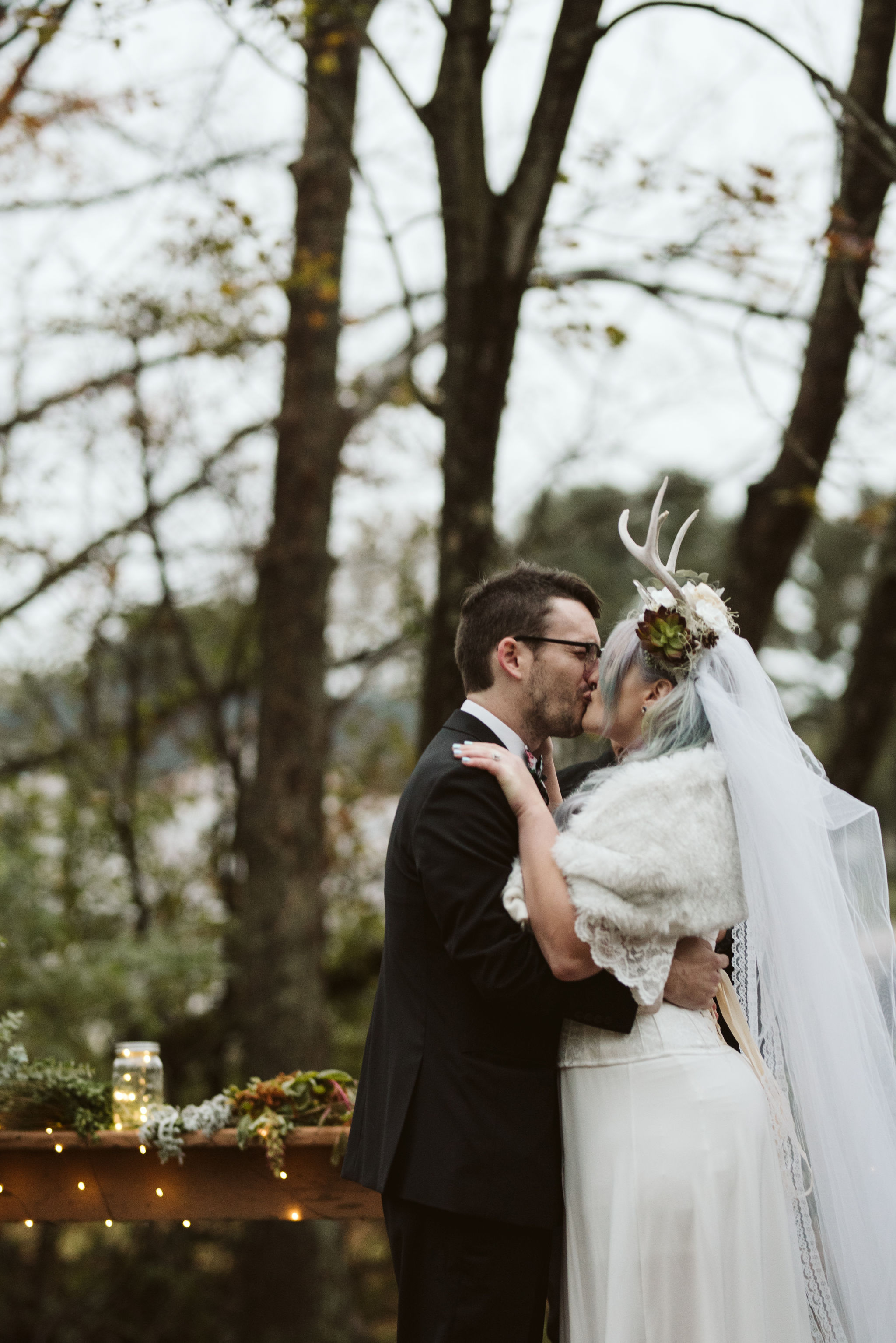  Maryland, Baltimore Wedding Photographer, Backyard Wedding, Fall, October, Dark Bohemian, Whimsical, Fun, Bride and groom Having First Kiss, Just Married, Flower Crown with Succulents and Antlers 