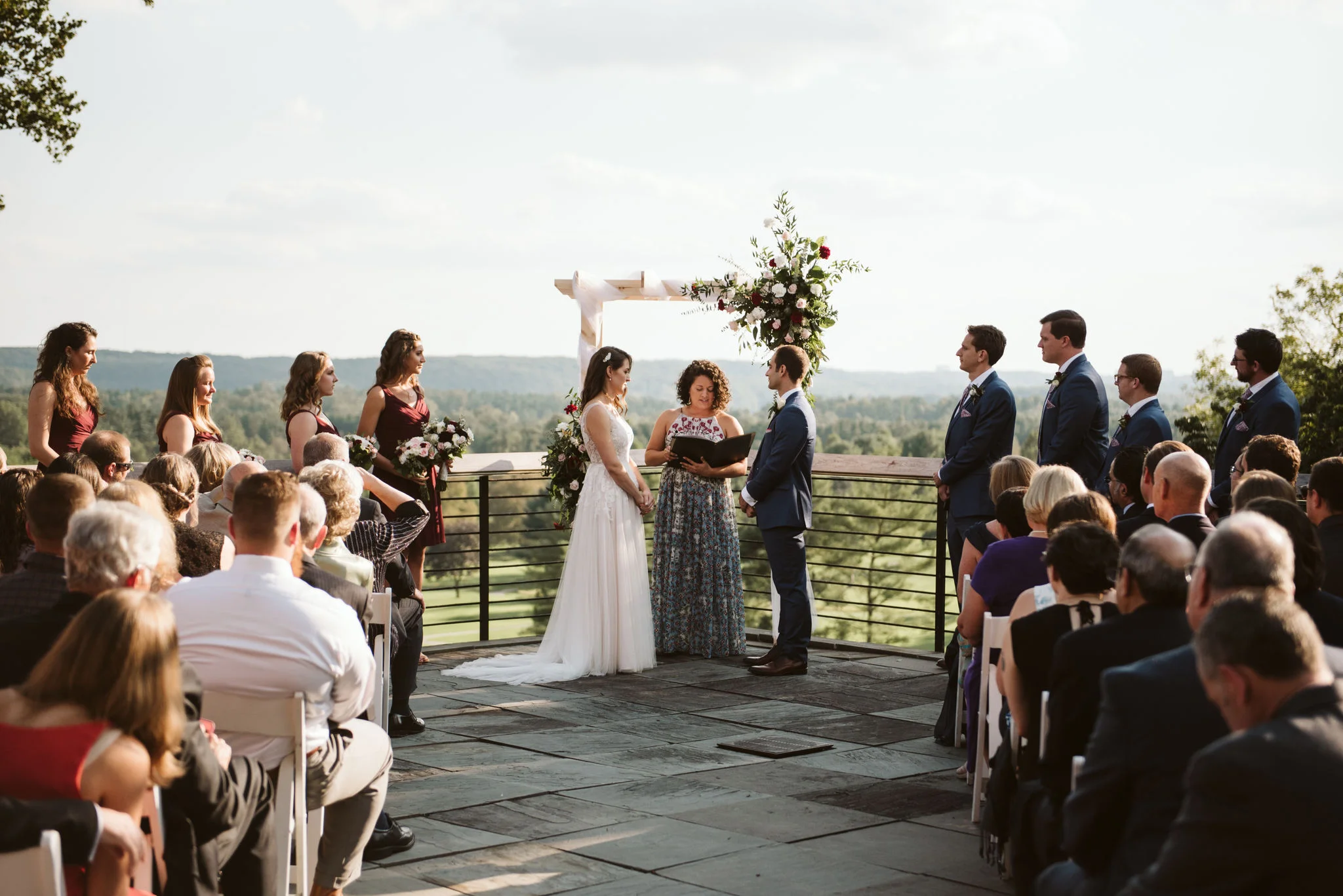 Phoenix Maryland, Baltimore Wedding Photographer, Eagle’s Nest Country Club, Classic, Romantic, Bride and Groom Standing in Front of Officiant and Forest View