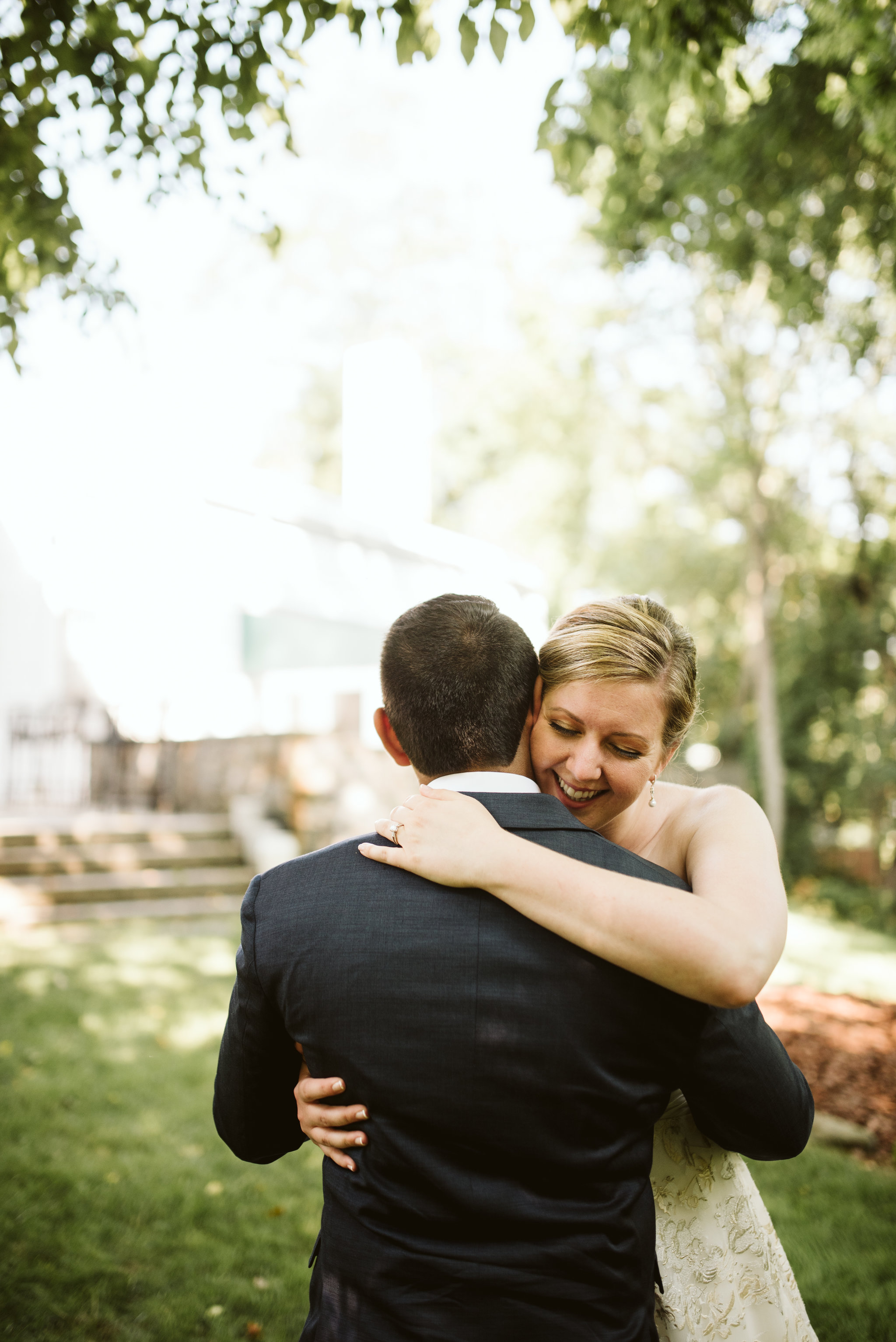  Ellicott City, Baltimore Wedding Photographer, Wayside Inn, Summer Wedding, Romantic, Traditional, Bride and Groom Hugging, Gold City Jewelers 