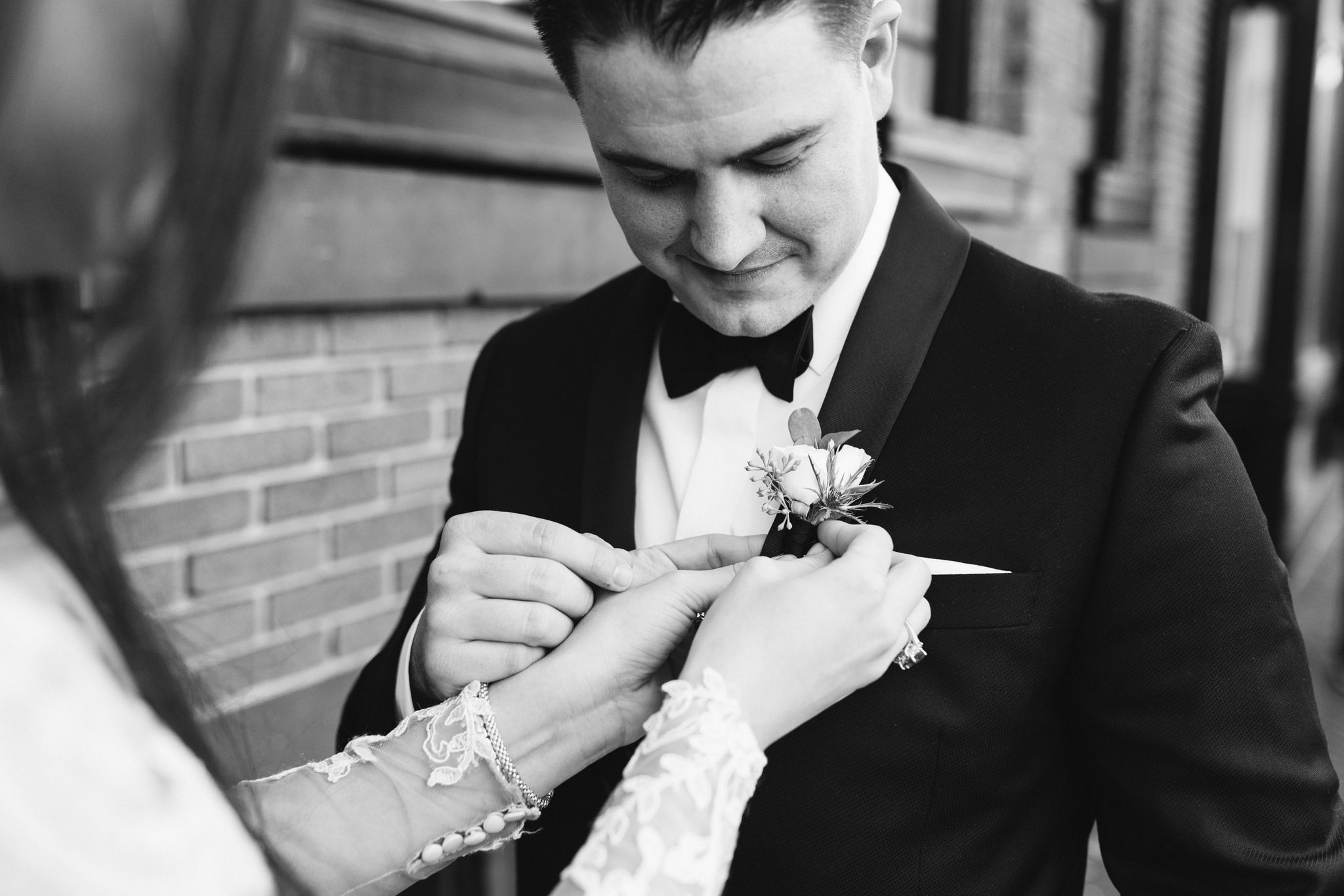  Baltimore, Fells Point, Maryland Wedding Photographer, Winter Wedding, Historic, Classic, Vintage, Bride Pinning Boutonniere on Groom, Black and White Photo 