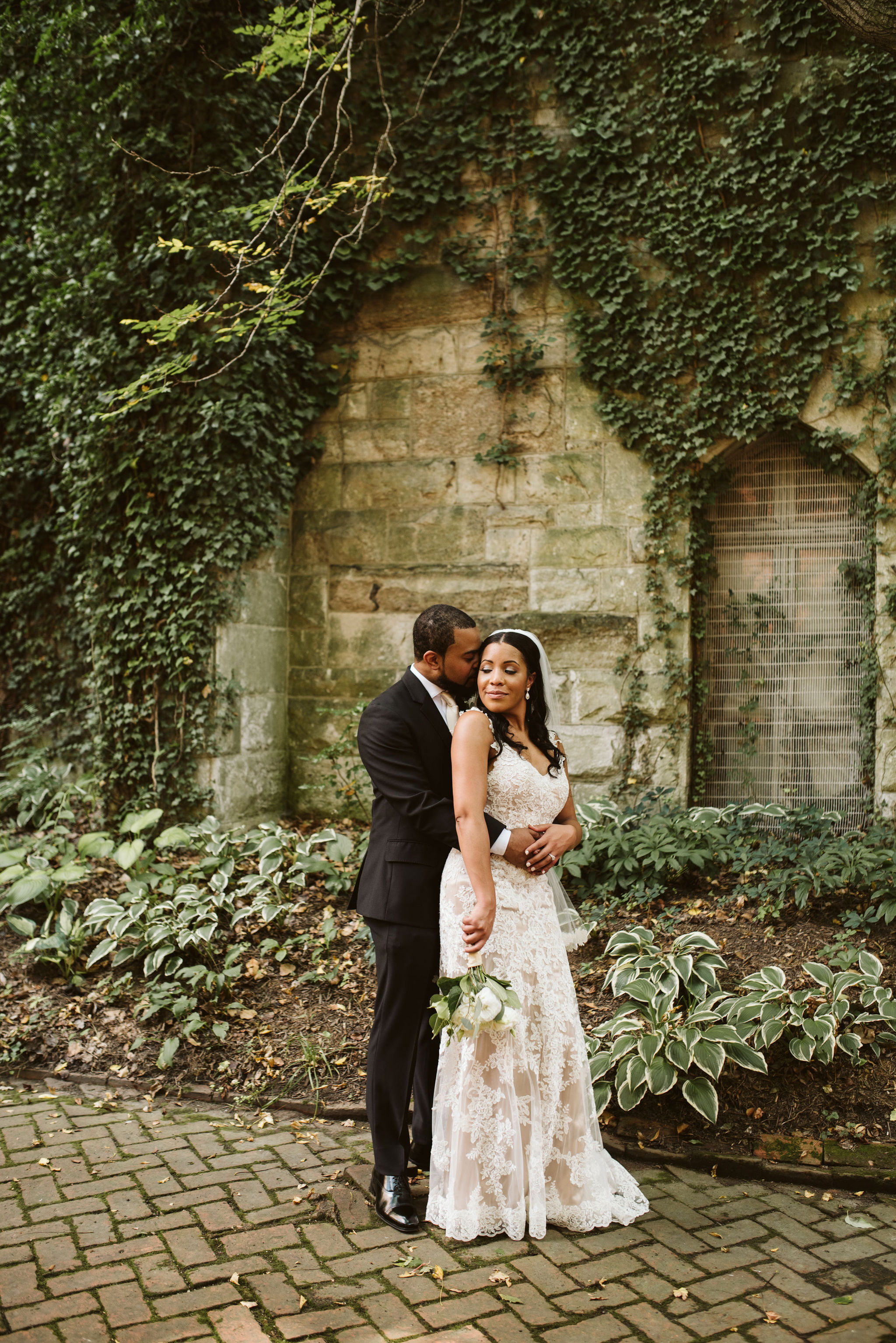  Baltimore, Maryland Wedding Photographer, Mount Vernon, Chase Court, Classic, Outdoor Ceremony, Garden, Romantic, Groom Hugging Bride from Behind, bride Looking Back at Groom, Lace Wedding Dress 