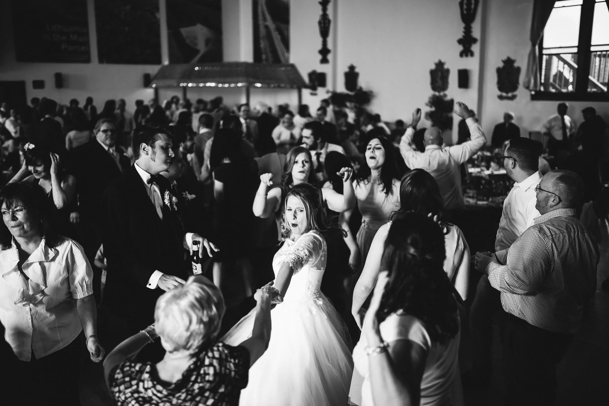 Baltimore, Lithuanian Dance Hall, Maryland Wedding Photographer, Vintage, Classic, 50s Style, Bride Dancing with Family, Black and White Photo, Wedding Guests Having Fun