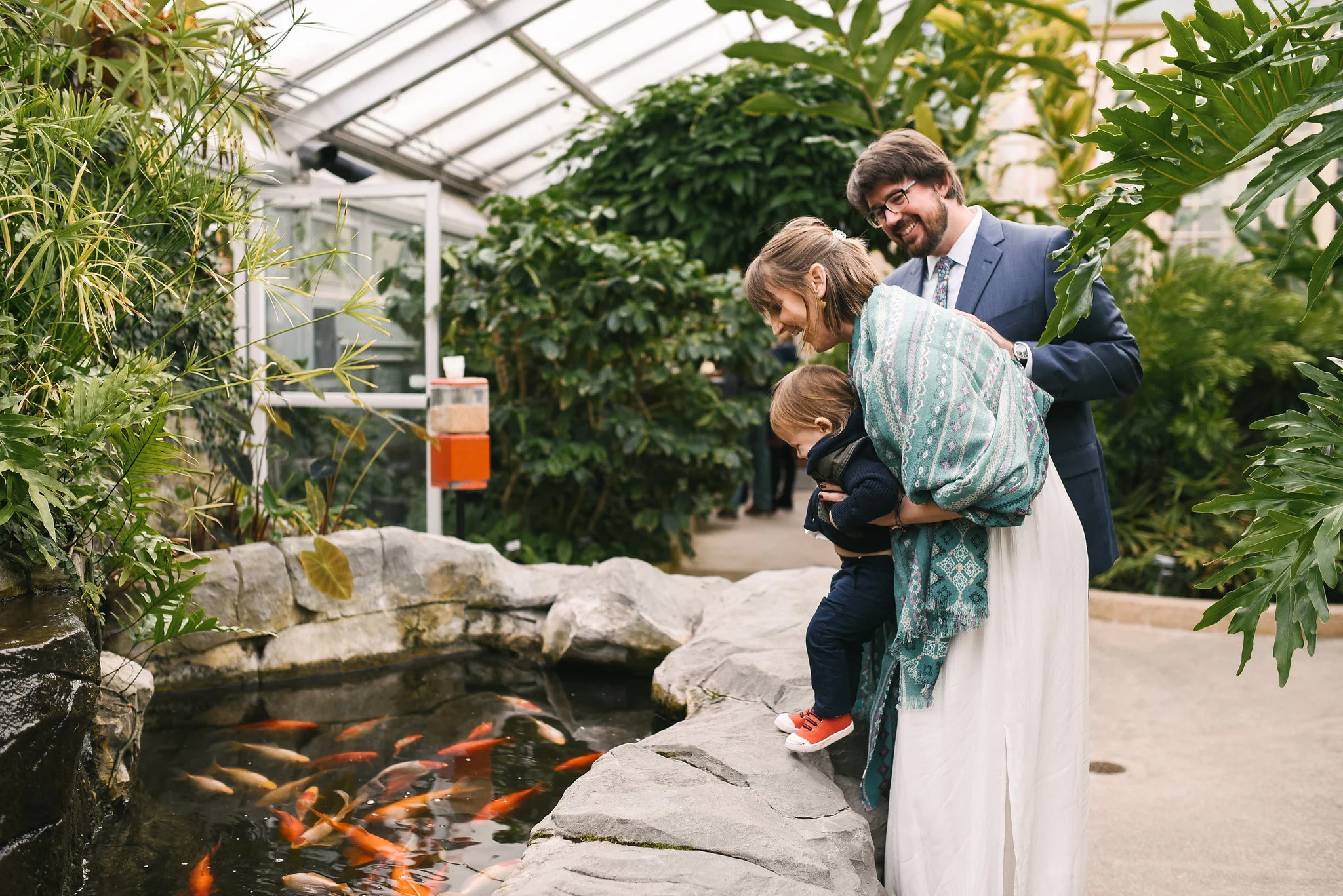 Rawlings Conservatory, Druid Hill Park, Intimate Wedding, Nature, Baltimore Wedding Photographer, Romantic, Classic, Bride and Groom with Son Looking at Koi Fish, Family Portrait