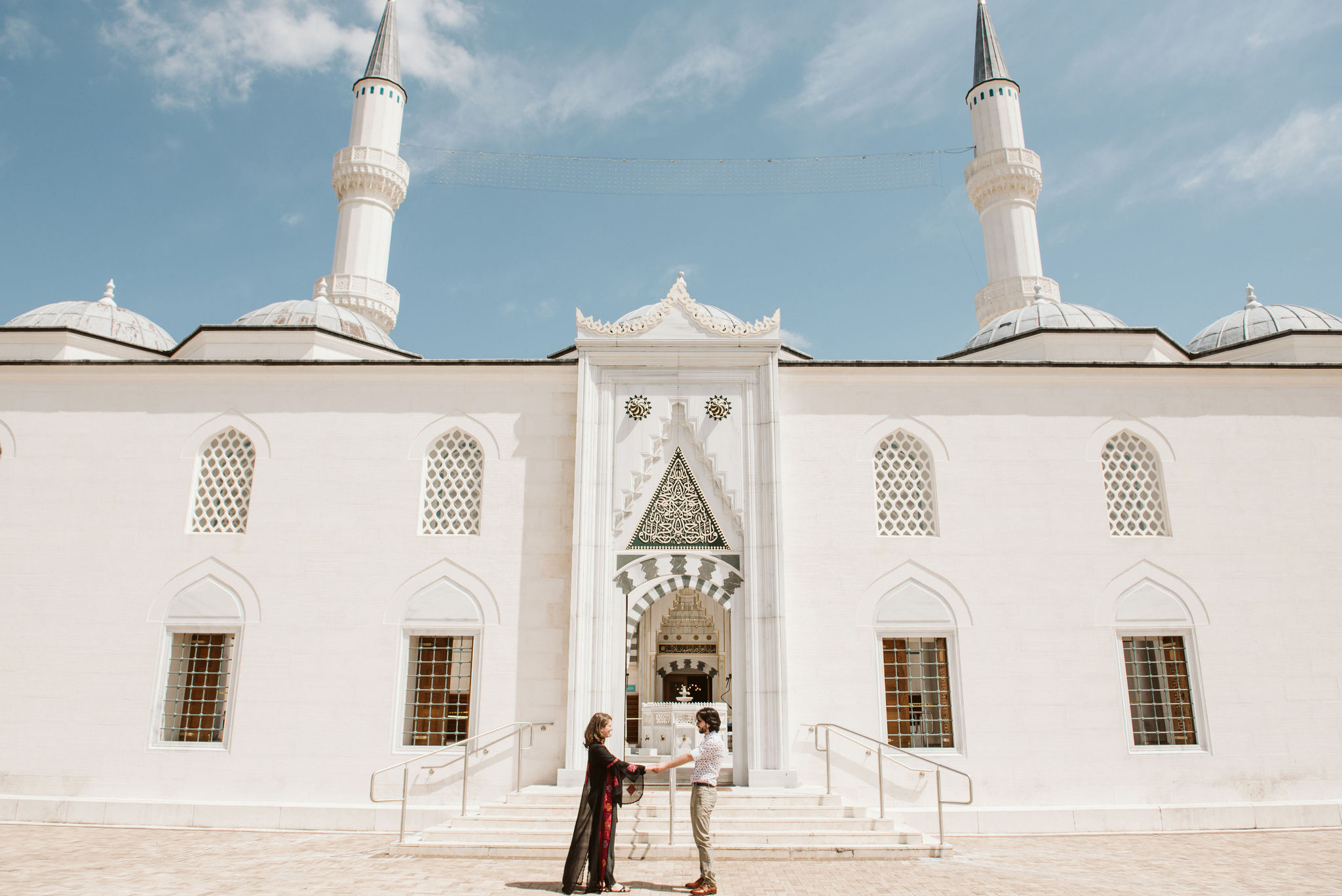    Washington DC, Baltimore Wedding Photographer, Diyanet Center of America, Spring, Intimate Wedding, Traditional, Classic, Palestinian, Turkish Design, Couple Holds Hands Outside of Venue  