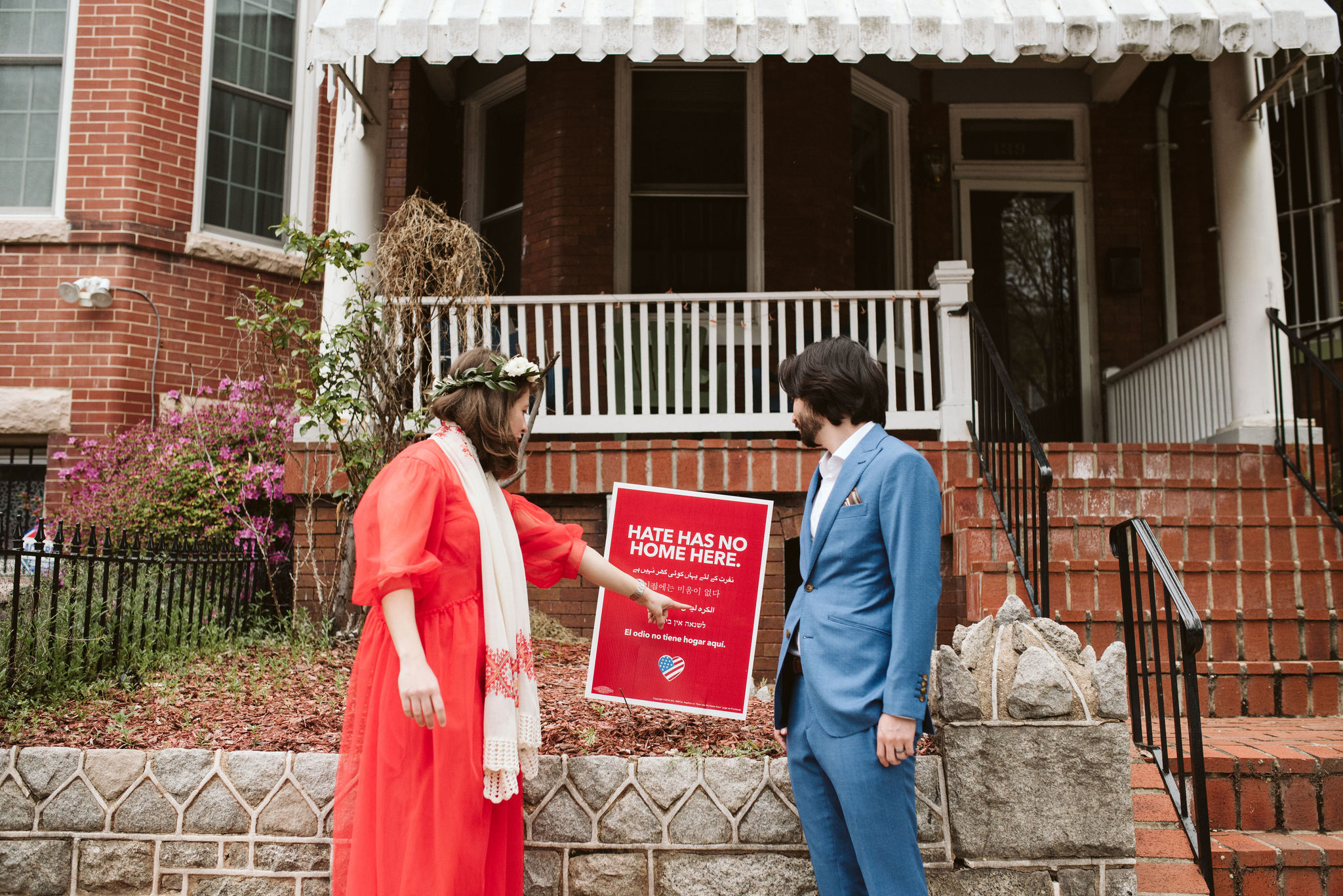  Washington DC, Baltimore Wedding Photographer, Spring, Intimate Wedding, Traditional, Classic, Palestinian, Turkish Design, Bride and Groom Pointing Out Yard Sign, No Hate, Red Dress 