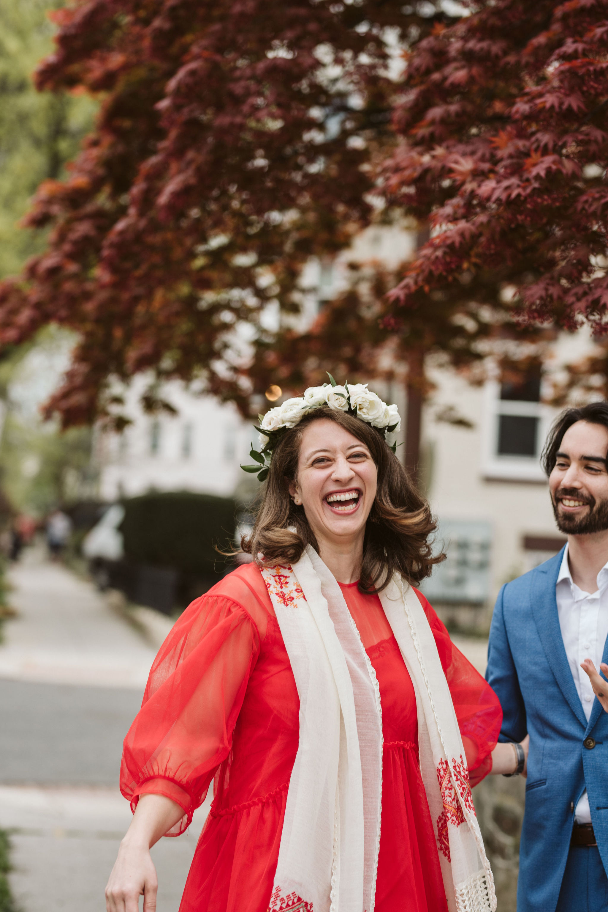  Washington DC, Baltimore Wedding Photographer, Intimate Wedding, Traditional, Classic, Palestinian, Bride and groom Laughing and Holding Hands, White Rose Flower Crown, Blue Suit, Red Dress 