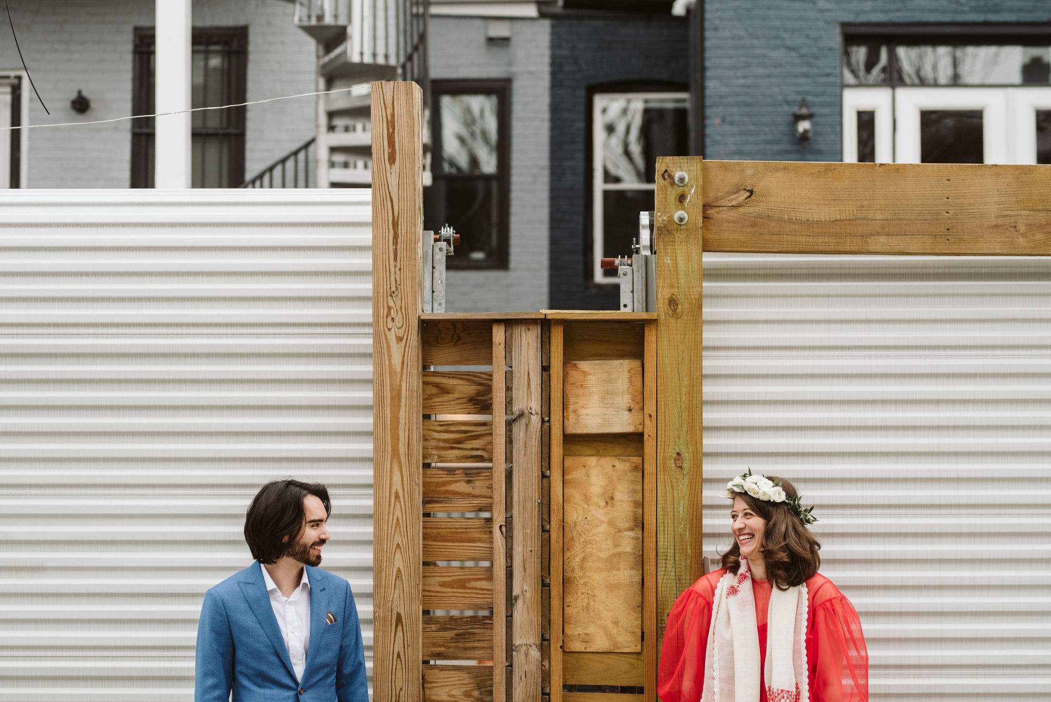  Washington DC, Baltimore Wedding Photographer, Intimate Wedding, Traditional, Classic, Palestinian, Portrait of Bride and Groom in Front of Industrial Gate, Couple Smiling at Each Other 