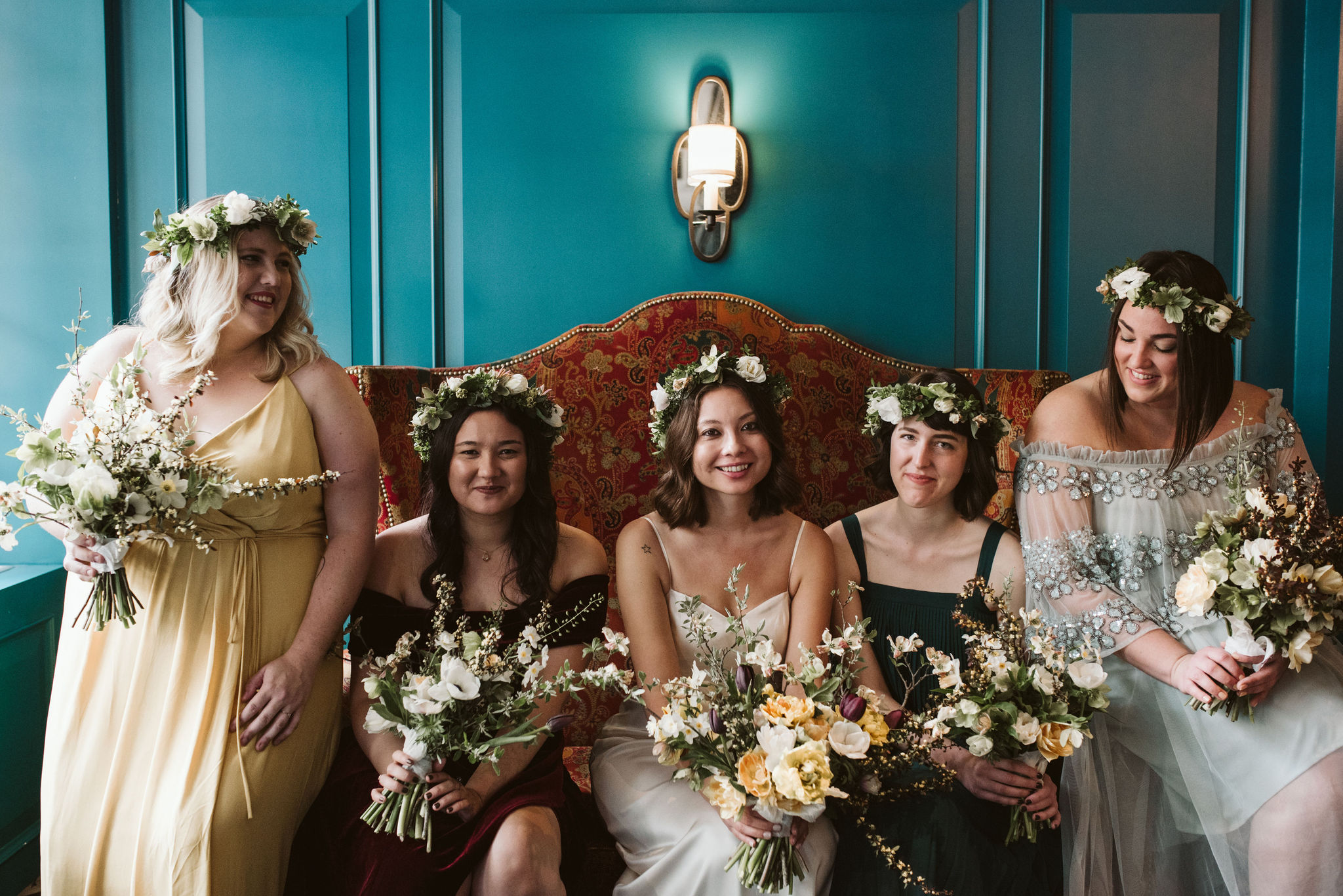  Washington DC, Baltimore Wedding Photographer, Alexandria, Old Town, Jewel Tone, Romantic, Modern, The Alexandrian Autograph Collection Hotel, Bride sitting with bridesmaids on vintage couch, Sungold Flower Co, Flower crowns 