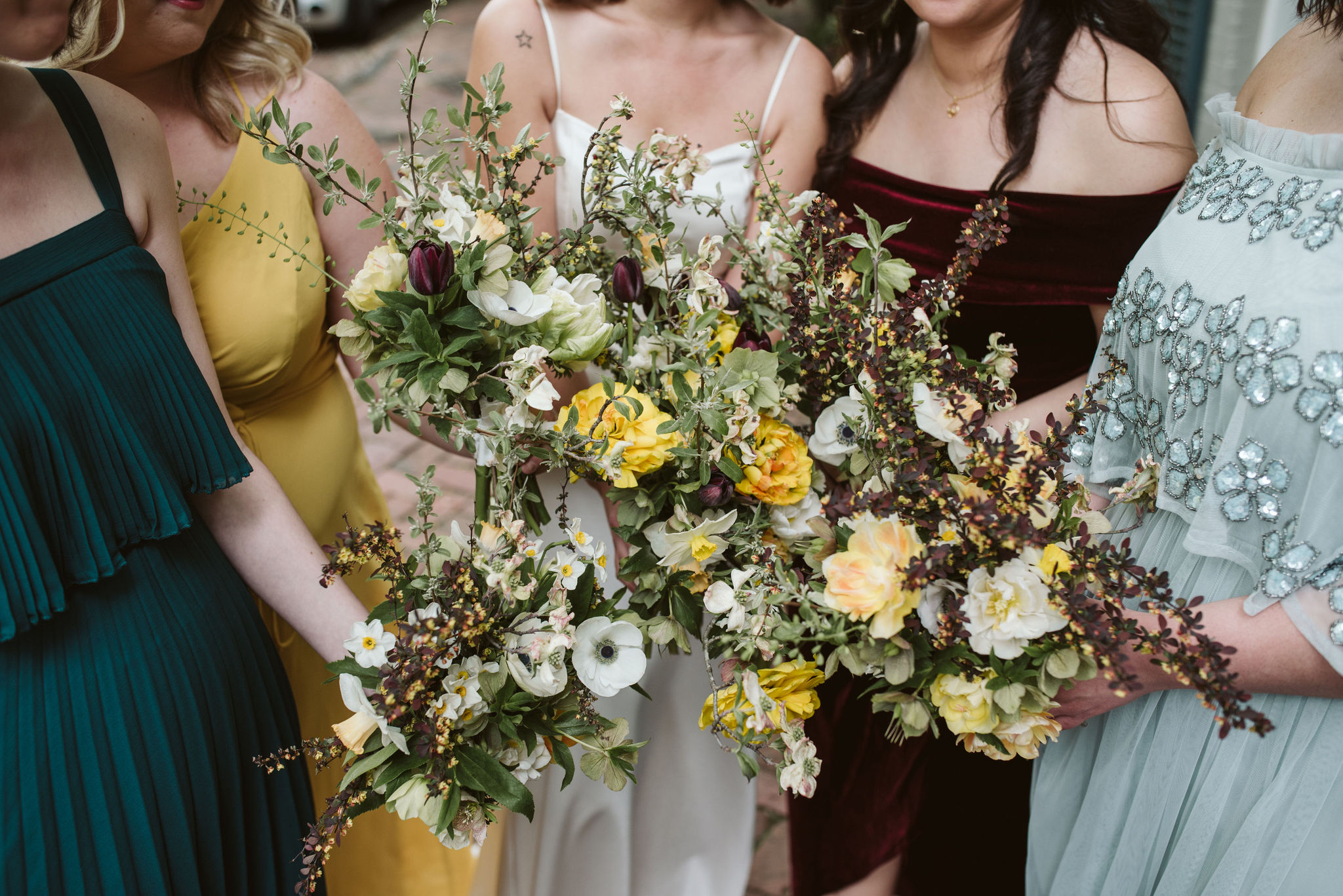  Washington DC, Baltimore Wedding Photographer, Alexandria, Old Town, Jewel Tone, Romantic, Modern, Bridesmaids holding bouquets, Natural arrangements of yellow white and purple flowers, Sungold Flower Co 