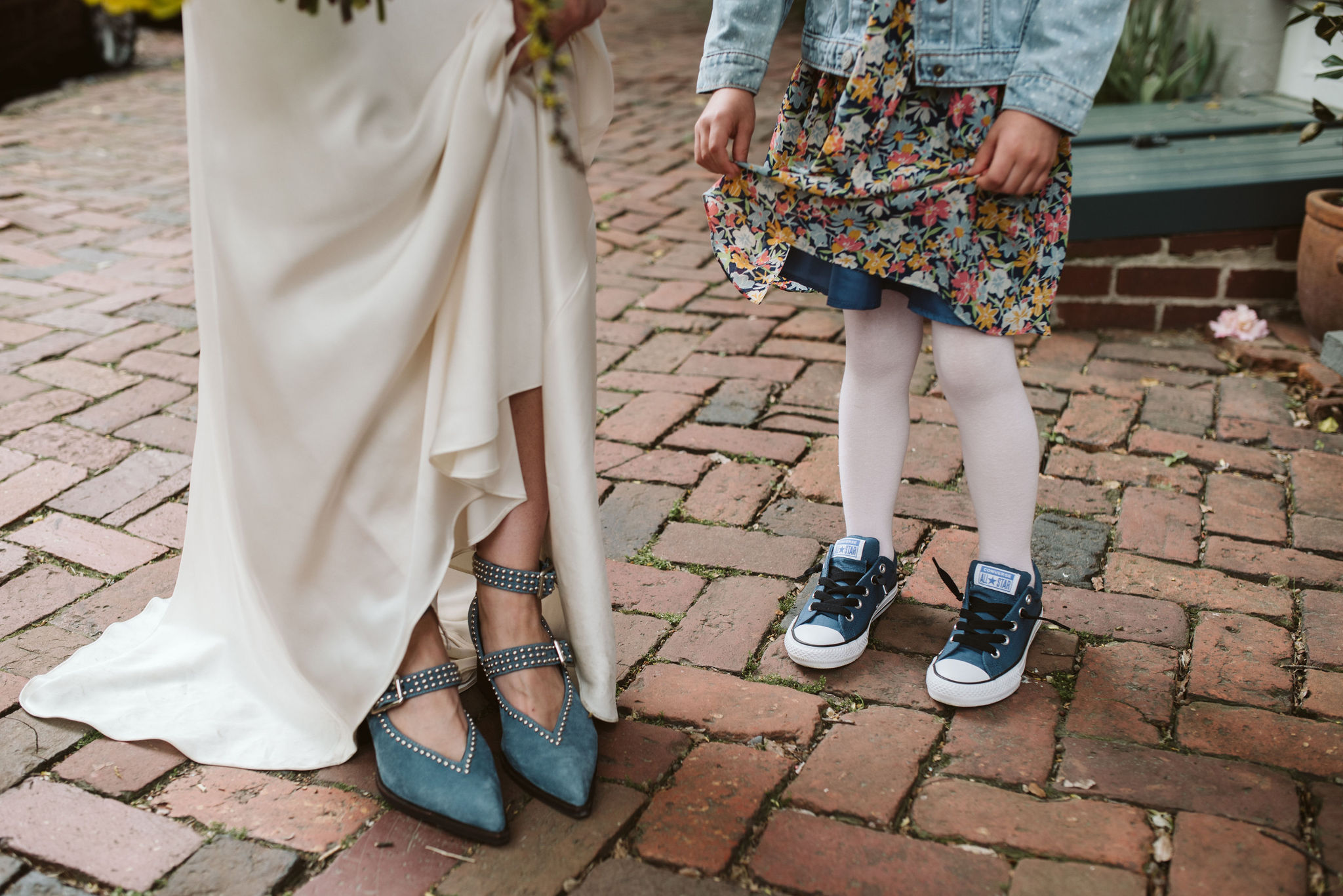  Washington DC, Baltimore Wedding Photographer, Alexandria, Old Town, Jewel Tone, Romantic, Modern, Bride showing blue suede wedding shoes with little girl showing blue Converse sneakers 