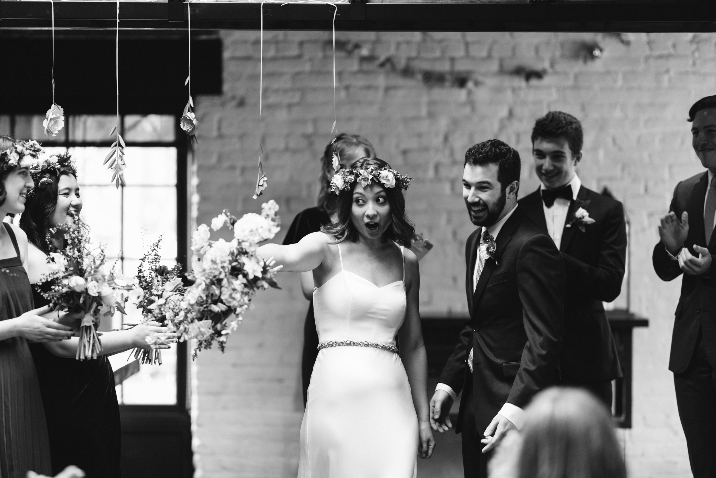  Washington DC, Baltimore Wedding Photographer, Alexandria, Old Town, Jewel Tone, Romantic, Modern, Virtue Feed &amp; Grain, Just Married, Fun Photo of Bride Pointing to Guests, Black and White Photo 