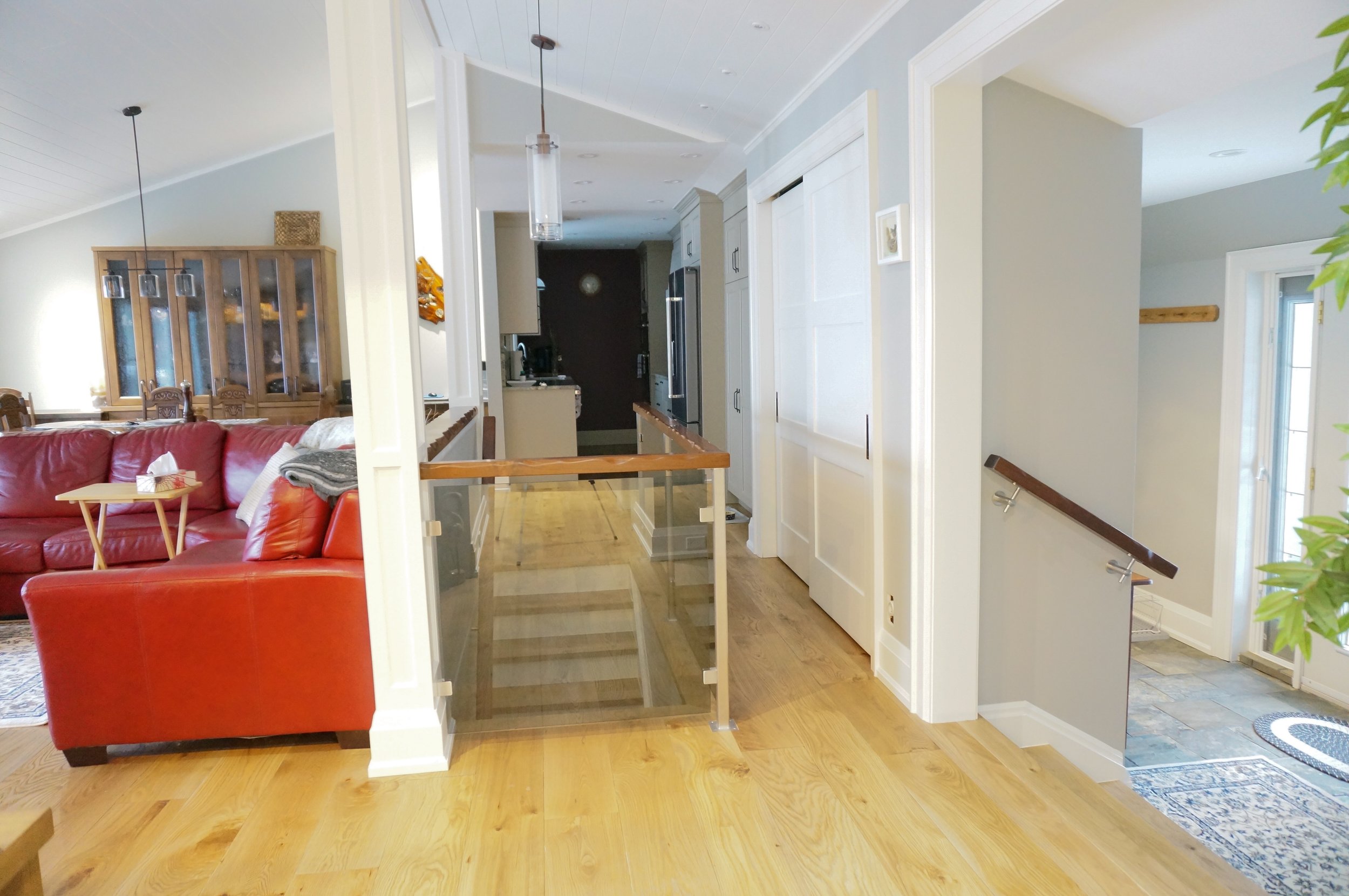  Glass and stainless guard rail, with wood wall mount handrails, and top rail. Boshkung Lake, Halliburton  