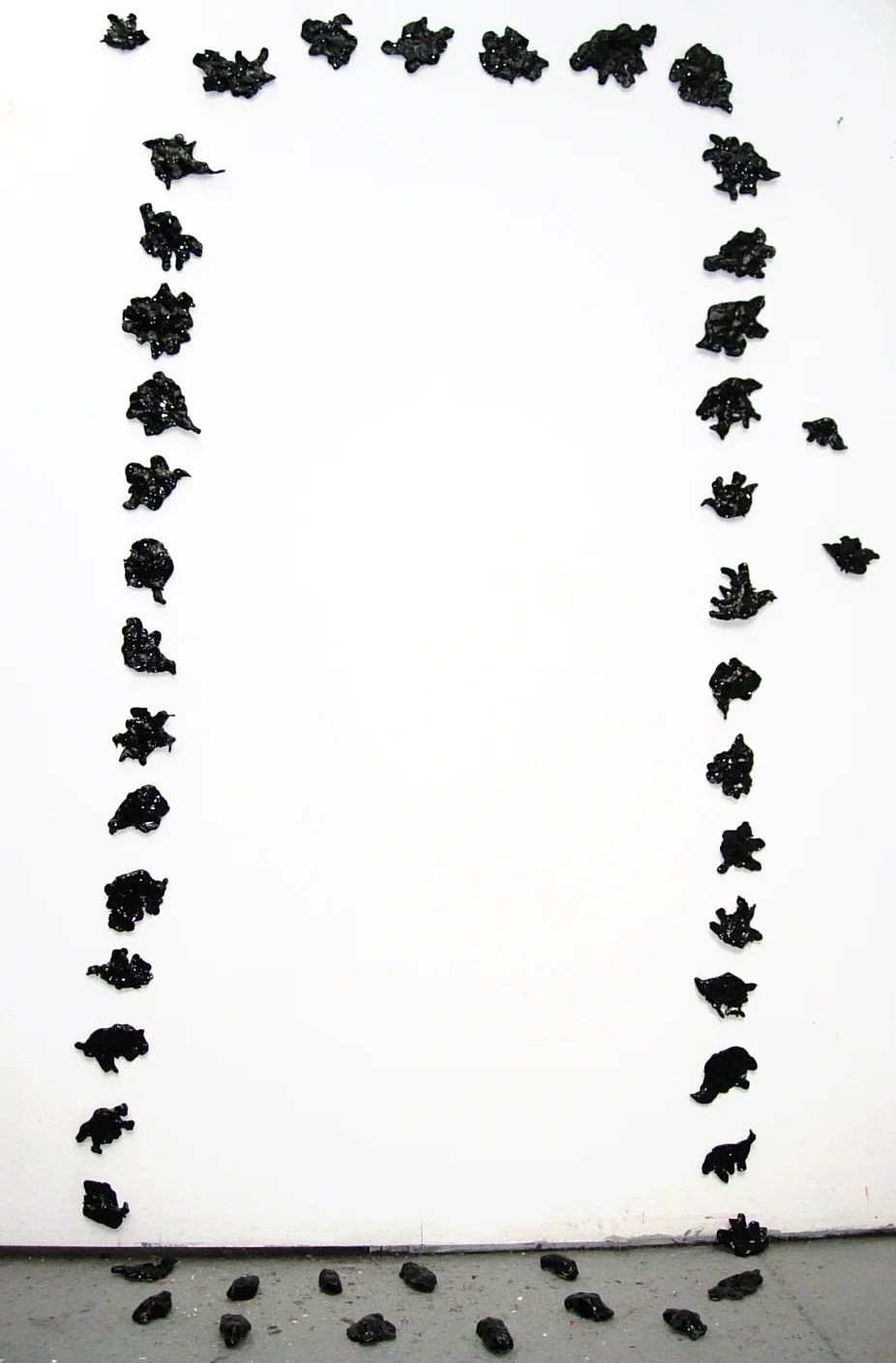 Flock, glazed clay, mounted on wall, dimensions variable