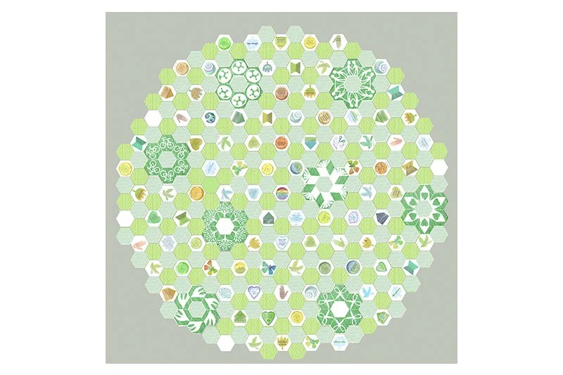  The finished tiling guide showing all the hexagonal tiles radiating from the centre so that they can be read as people walk around the periphery. 