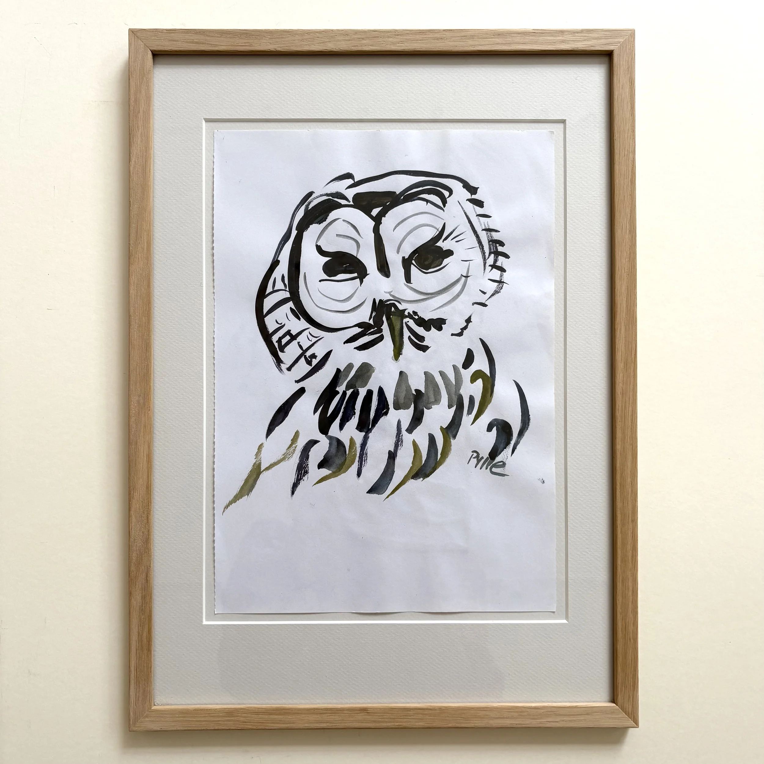 A sketch drawing from the book with sketches for lid owls, with oak frame