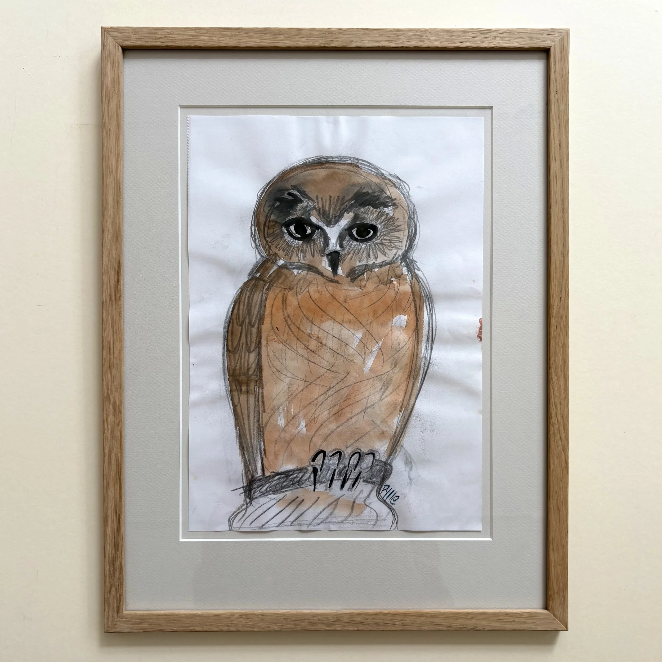 A sketch drawing from the book with sketches for lid owls, with oak frame