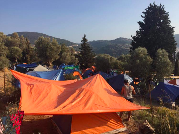 Tents currently fill the extended area of the camp on Samos where families live for months on end in cold and rainy conditions. By Melissa Pawson. Samos, Greece: 2018. JPG file.