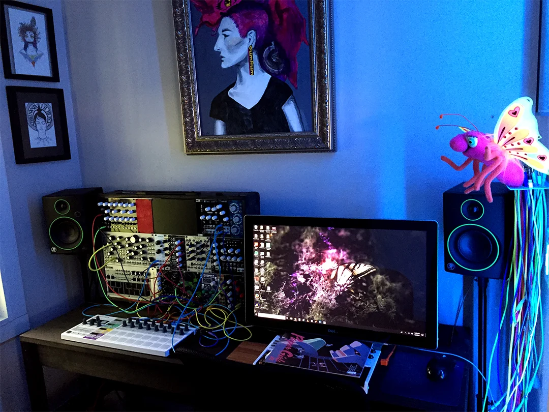Here's my current studio setup. I use an Akai MPK mini for my midi controller, but it's hiding underneath a Paper Girls comic. Also, I've added more modules to my rack. My account on Modular Grid always has my most current rack info.