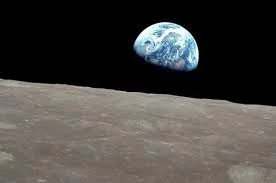 Apollo 8 Astronaut William Anders snapped this photo, "Earthrise" while orbiting the moon on Christmas Eve 1968.