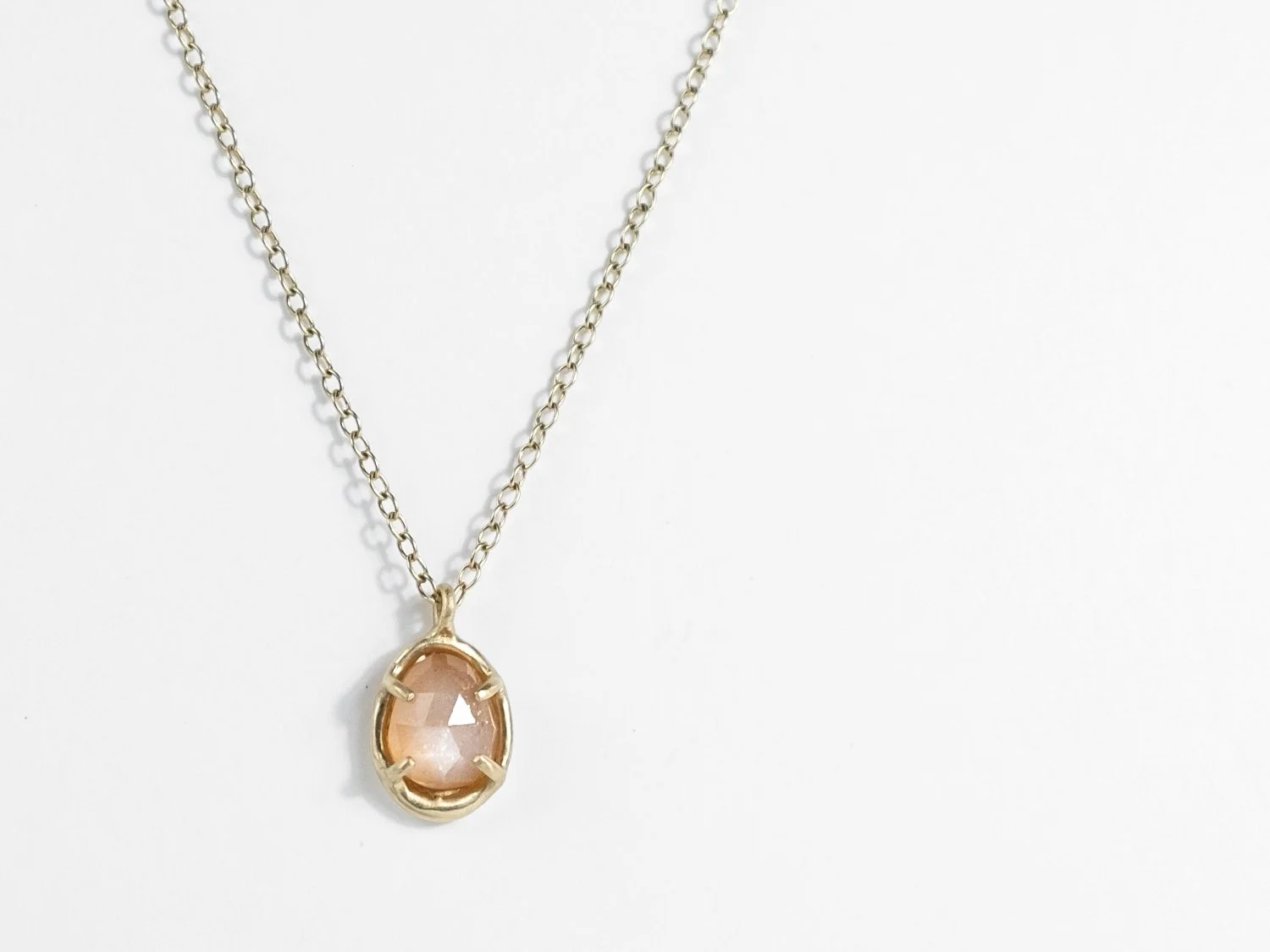 Lucky Petal Charm in gold and moonstone
