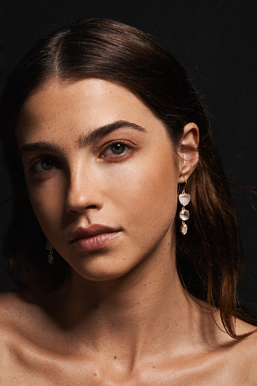 Ridgeline Drop Earrings in clear and raw crystal quartz by Sara Golden