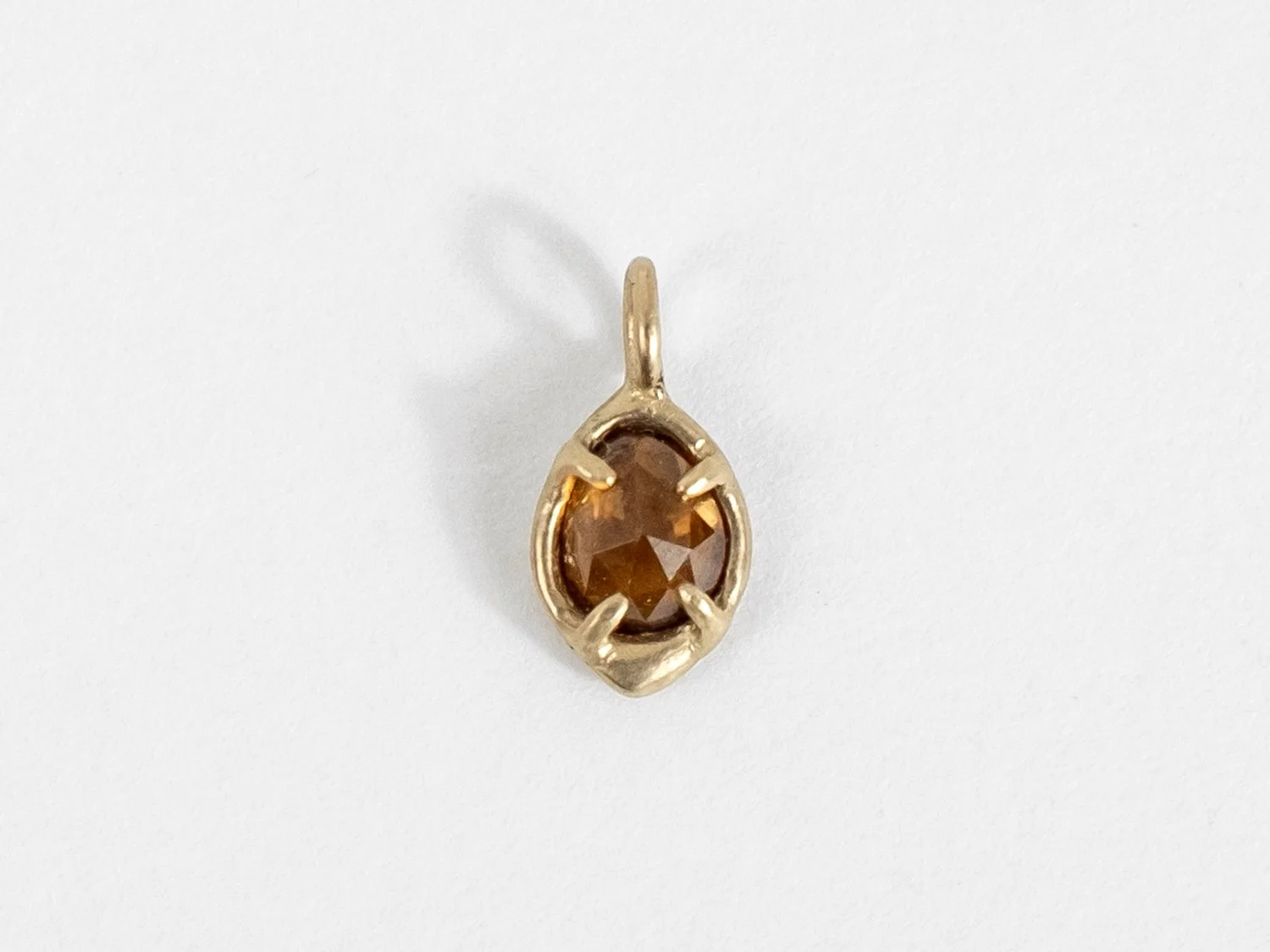 14k gold and deep golden zircon charm