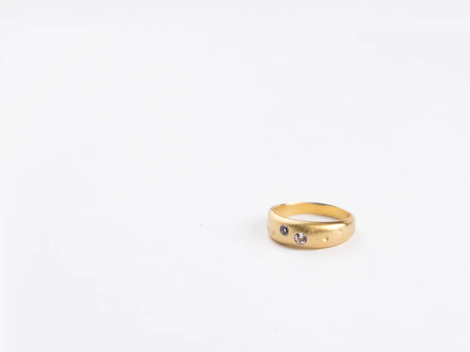 Cygnus Ring in gold and white topaz, by Sara Golden Jewelry.