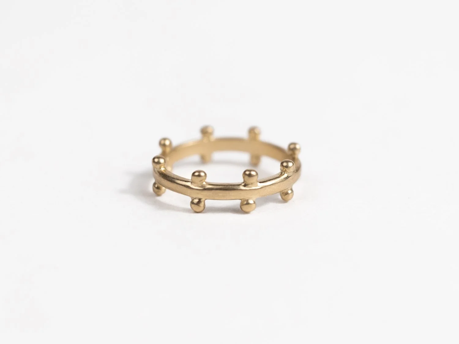 Gold Saros Ring main image 1