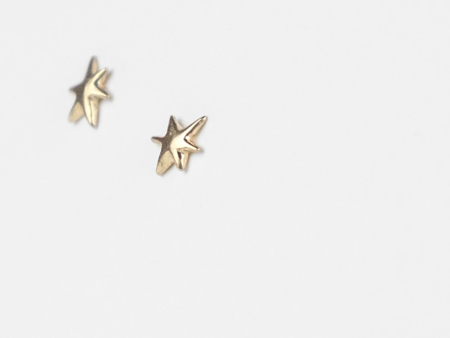 6-pointed star stud earrings in gold by Sara Golden Jewelry