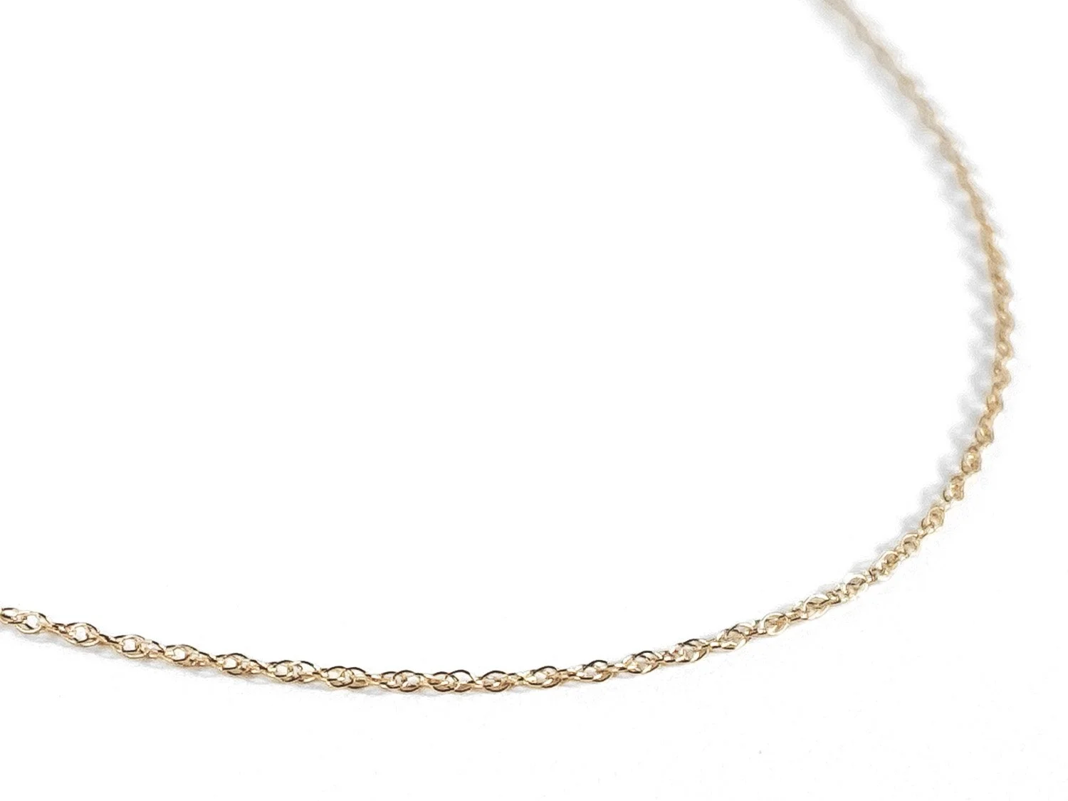 Thin gold rope-style chain necklace