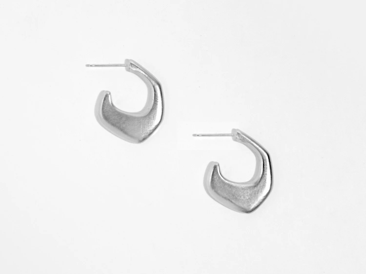 Organically-shaped huggie-style earrings in sterling silver