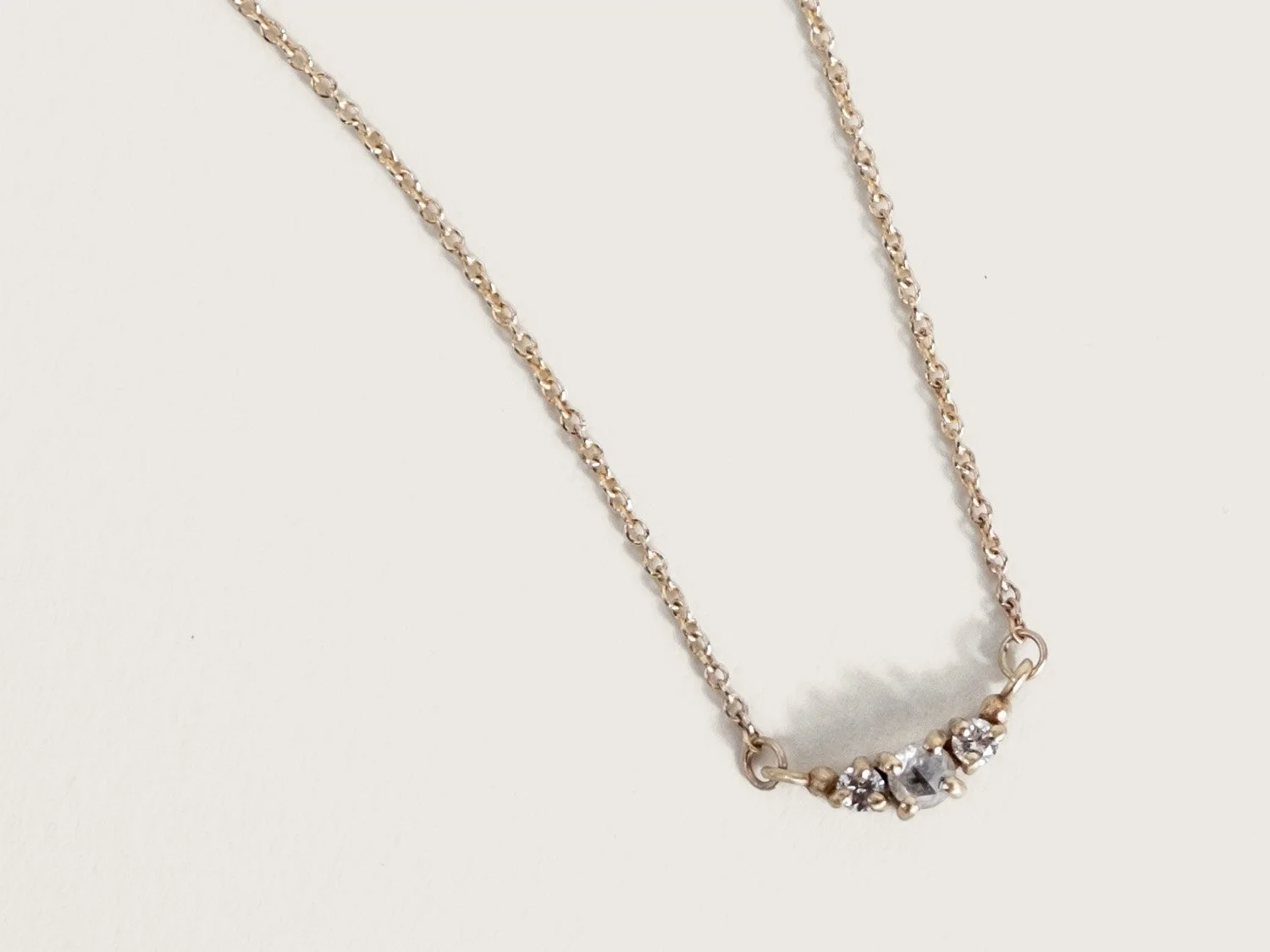 Delicate gold necklace with icy white and brilliant white diamonds
