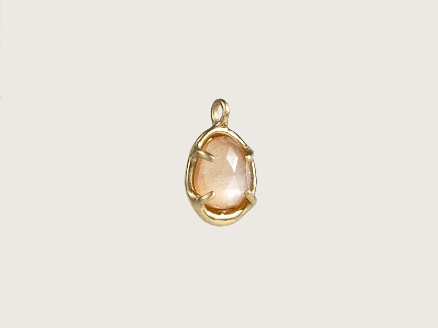 14k gold and peach moonstone charm