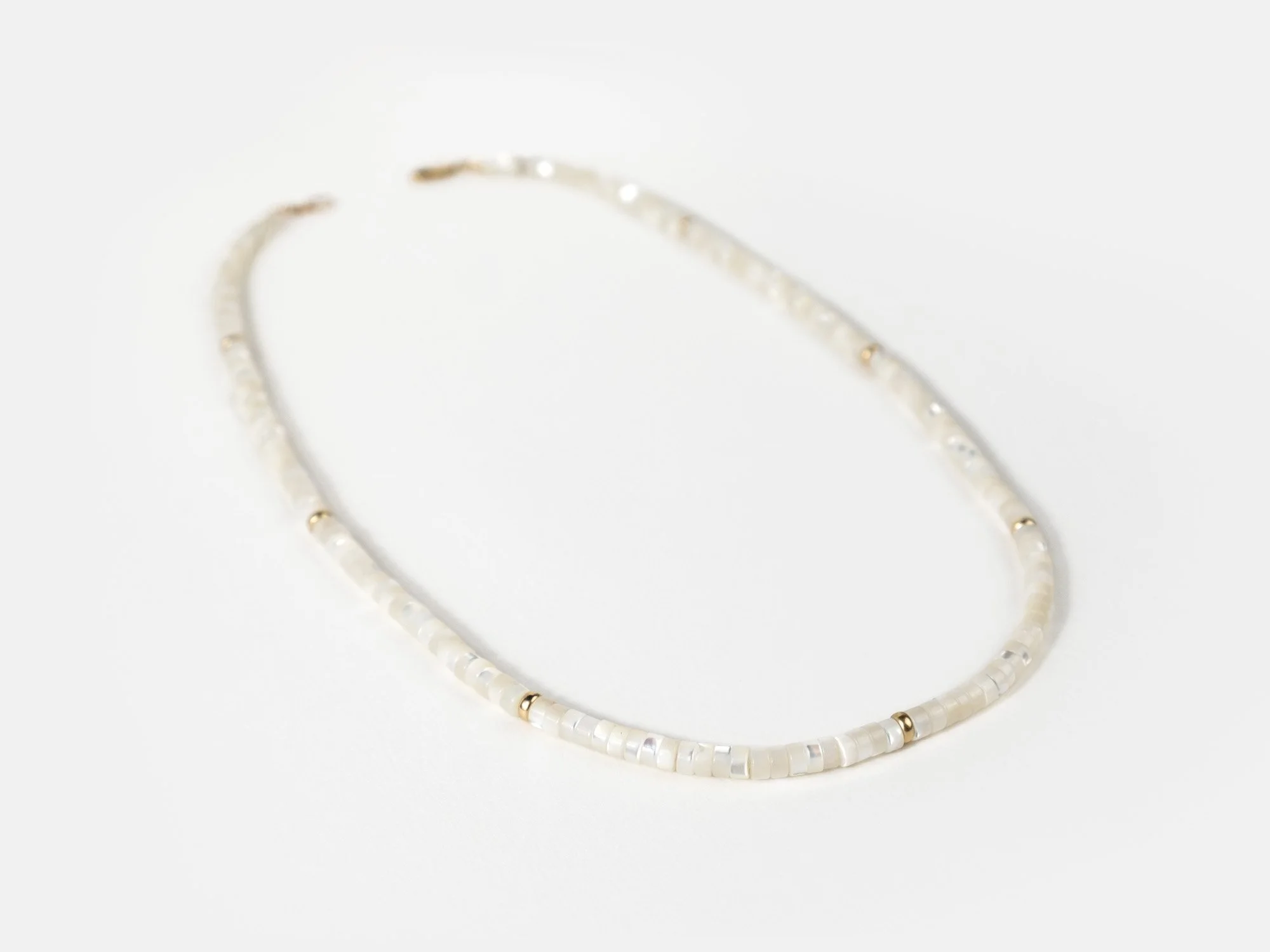 Necklace with mother-of-pearl and gold beads by Sara Golden Jewelry