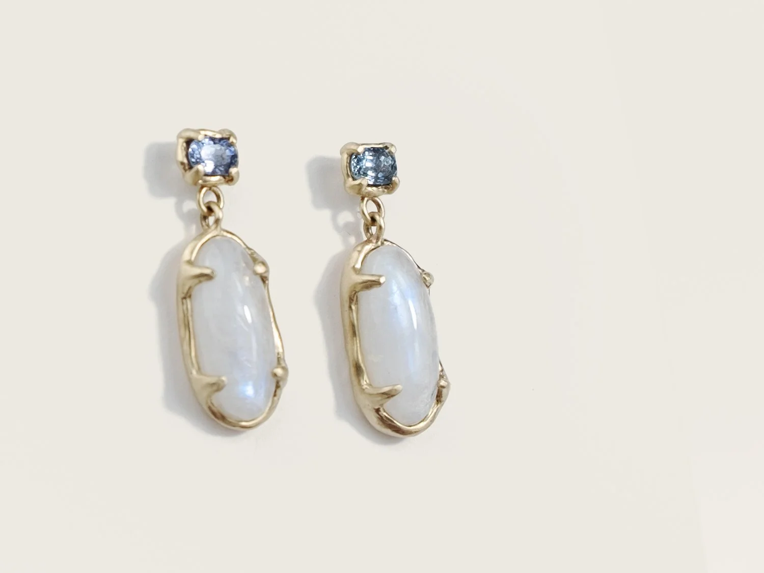 14k gold earrings with top sapphire stone and hanging moonstone by Sara Golden Jewelry