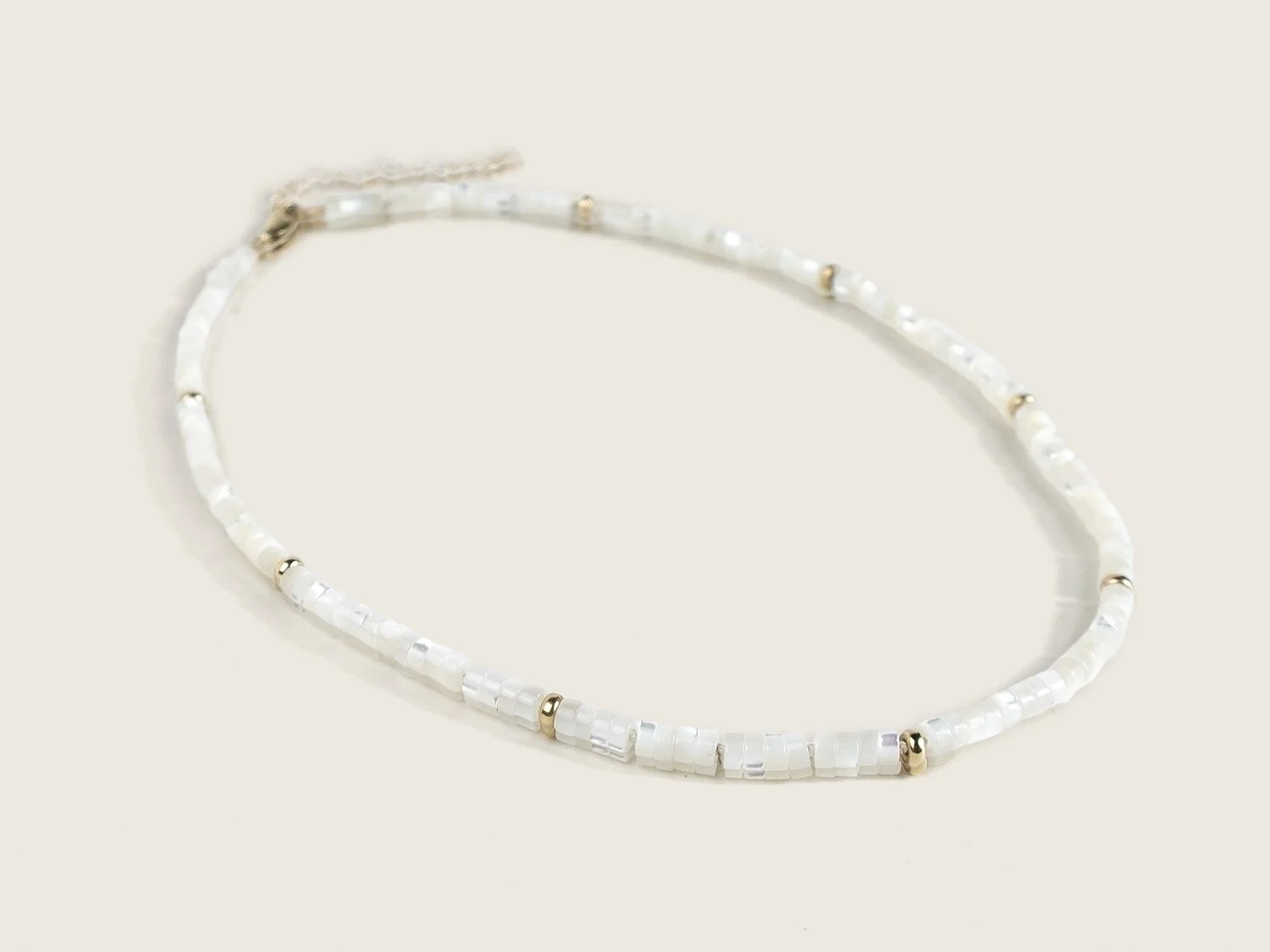 Mother of pearl and gold bead necklace