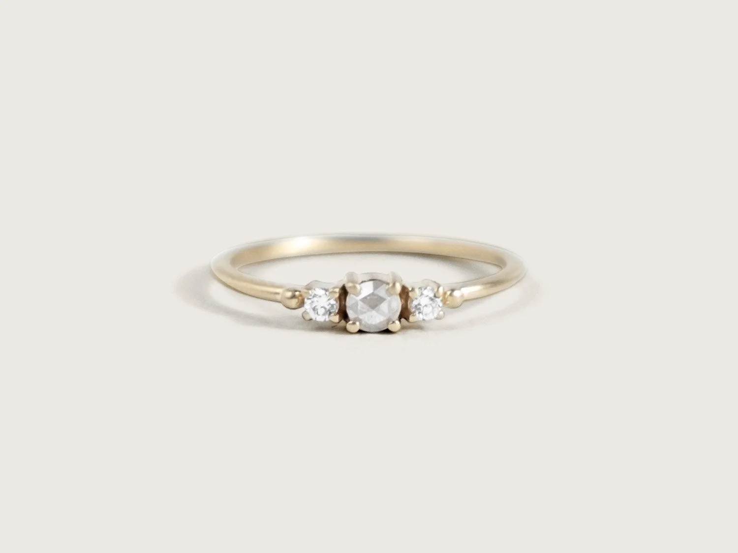 Thin gold ring with icy white and brilliant white diamonds